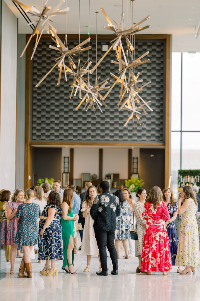 Crowd gathering during cocktail hour.