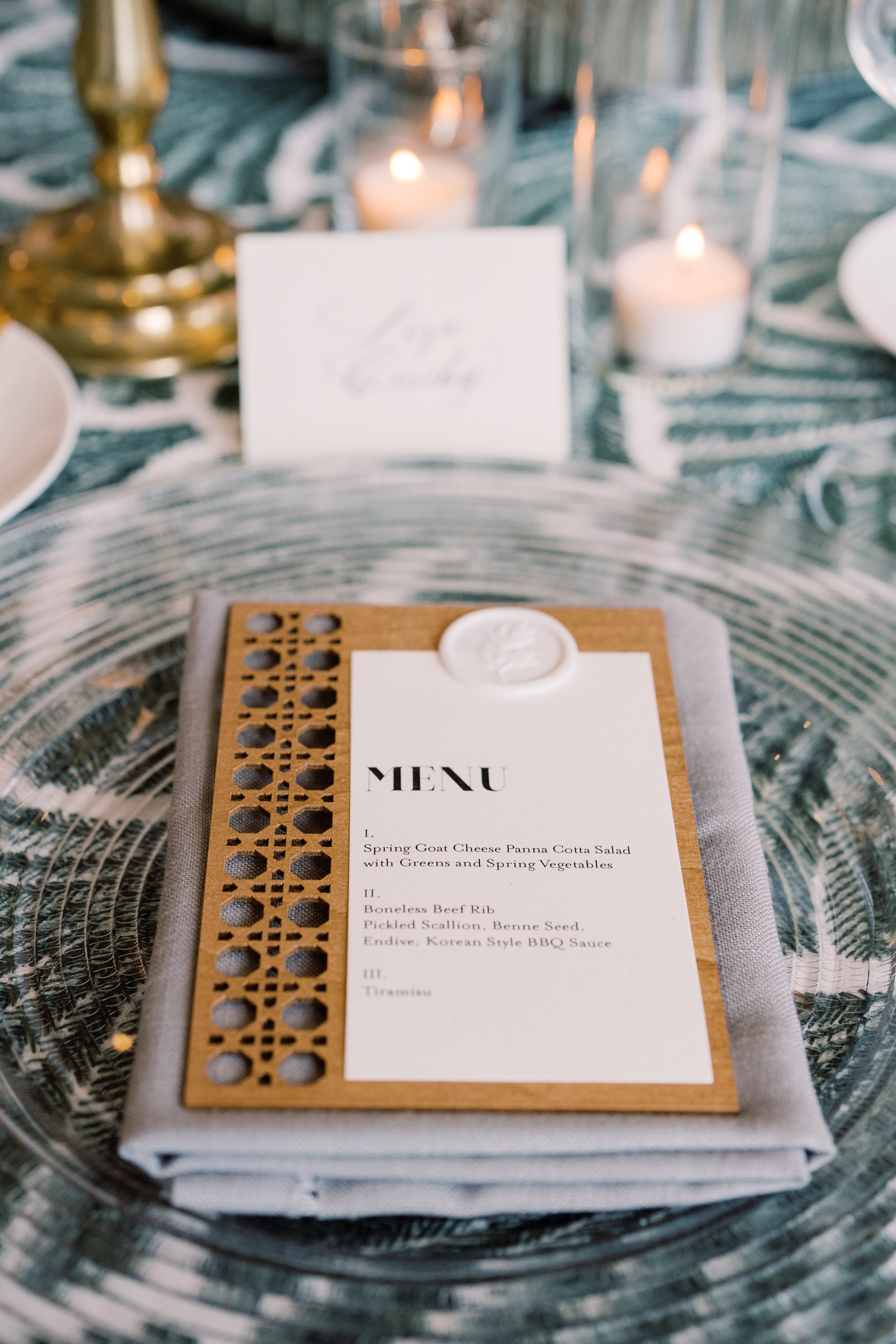 Laser cut custom menu at table setting.