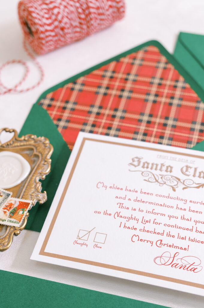 Plaid-lined green envelope displaying a Letter from Santa.