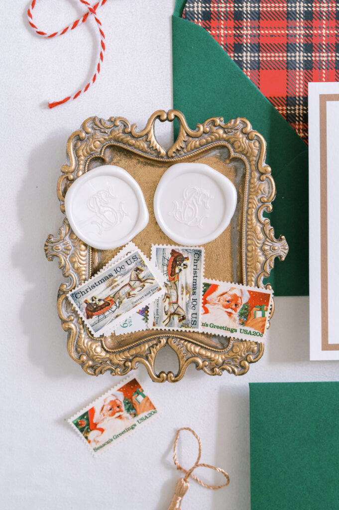 antique tray with white, custom wax seals and vintage postage