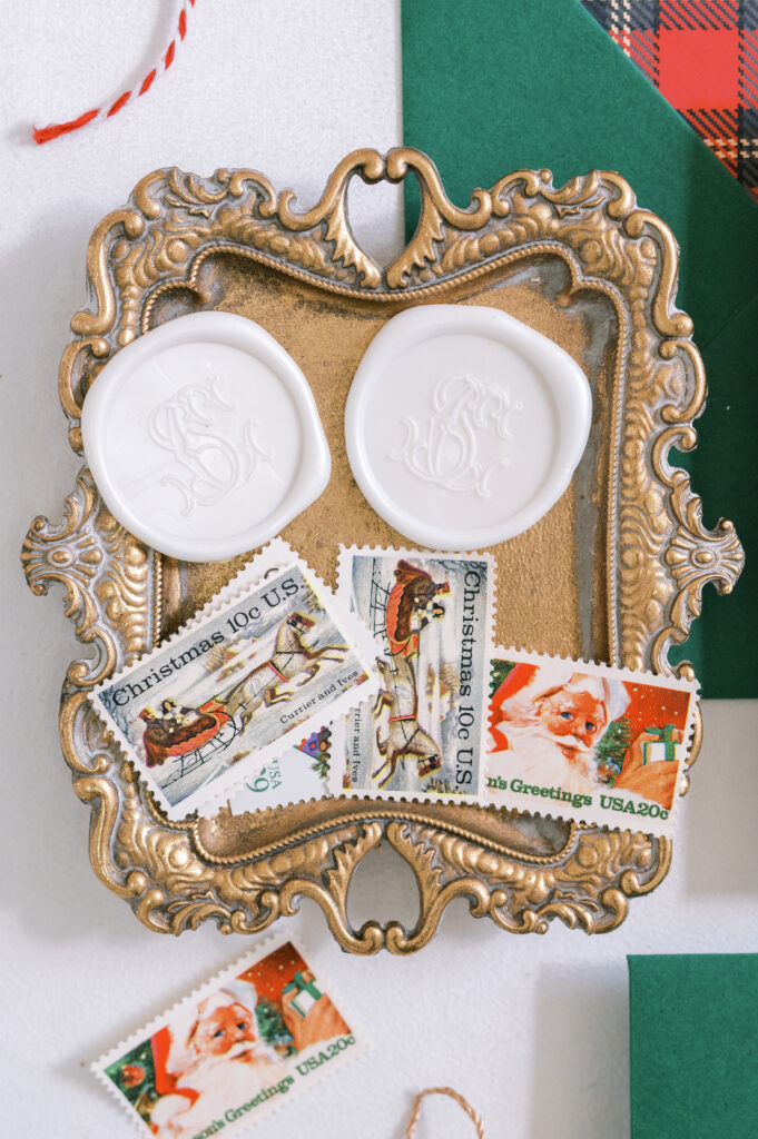 antique tray with white, custom wax seals and vintage postage