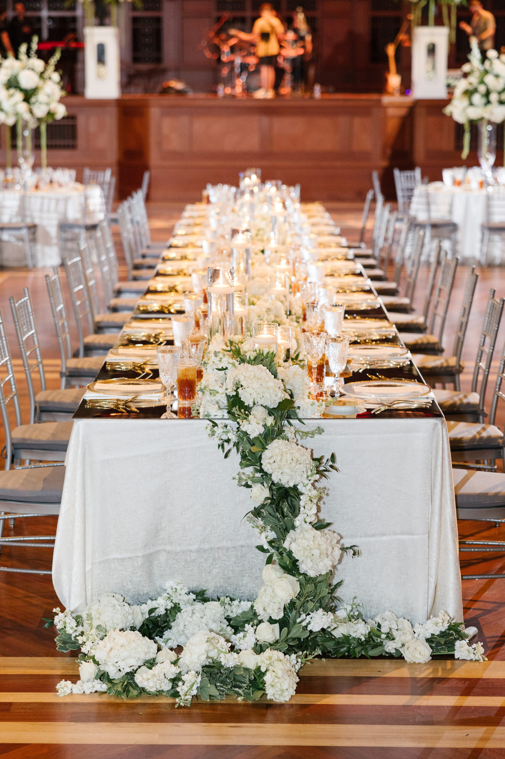 Formal dining table complete with linen, place settings and florals from Elevated Nashville Symphony Wedding. 
