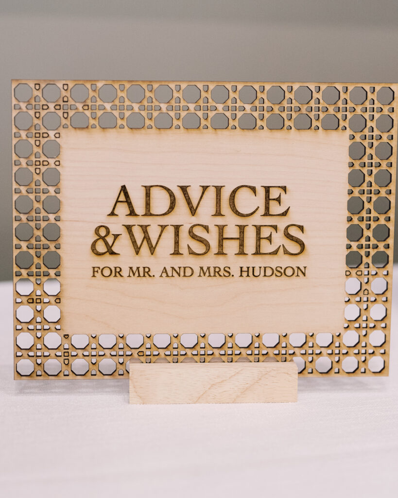 Wooden, laser-cut table signage.