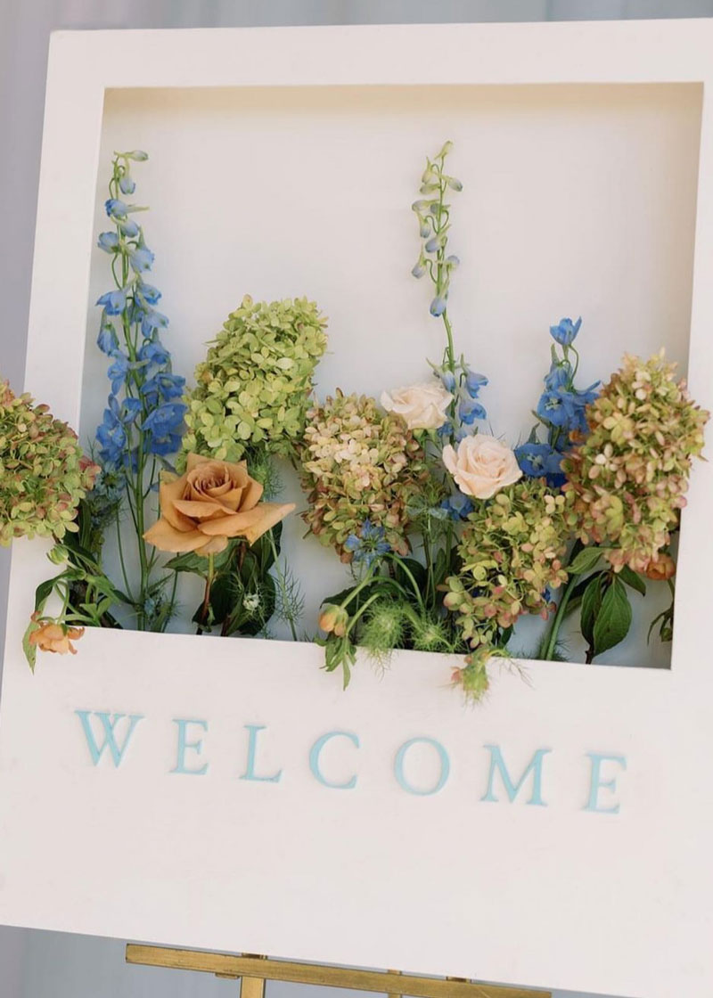 Custom Flora Welcome Sign by White Ink Calligraphy
