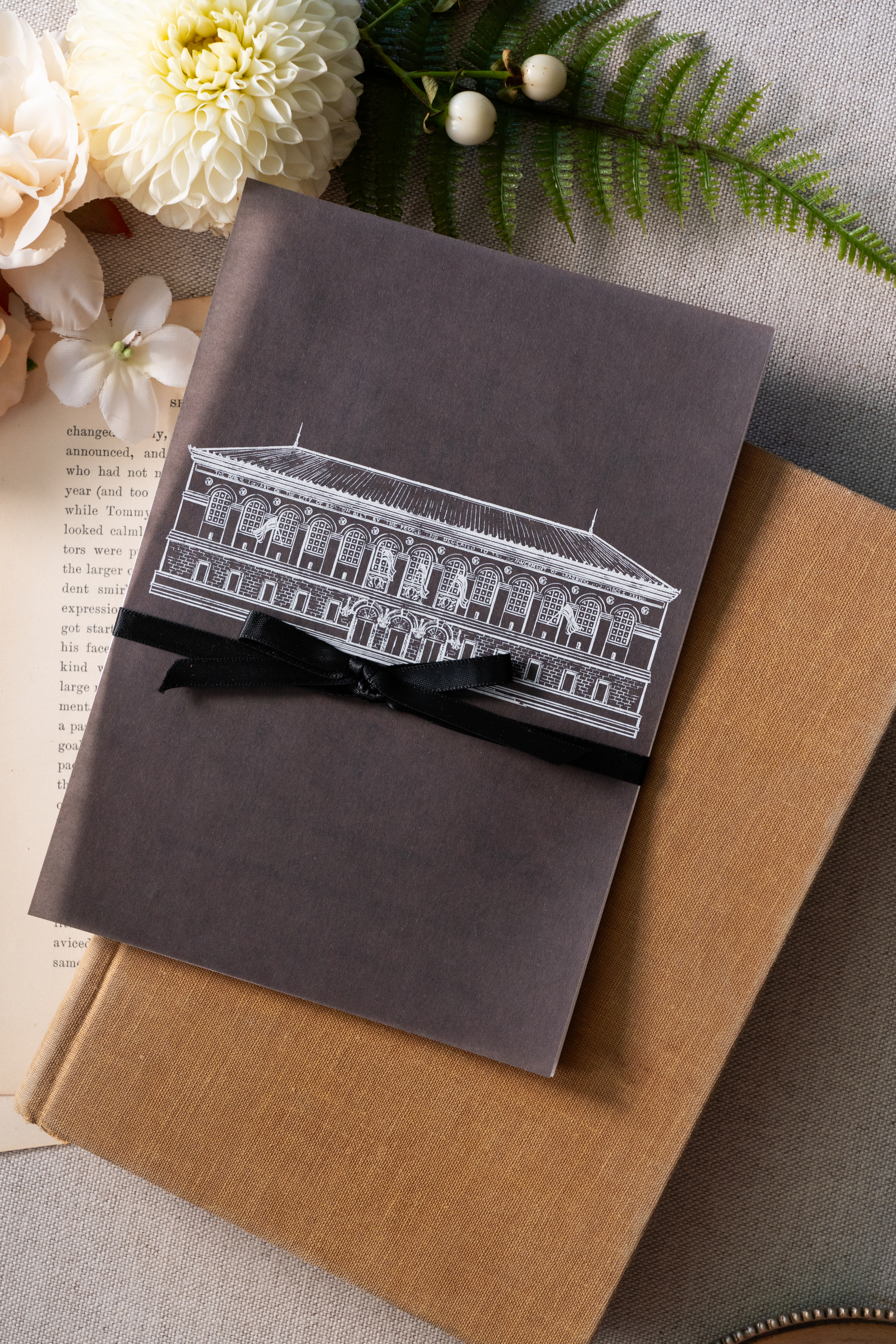 invitation suite with print of Boston Public Library, tied with black ribbon