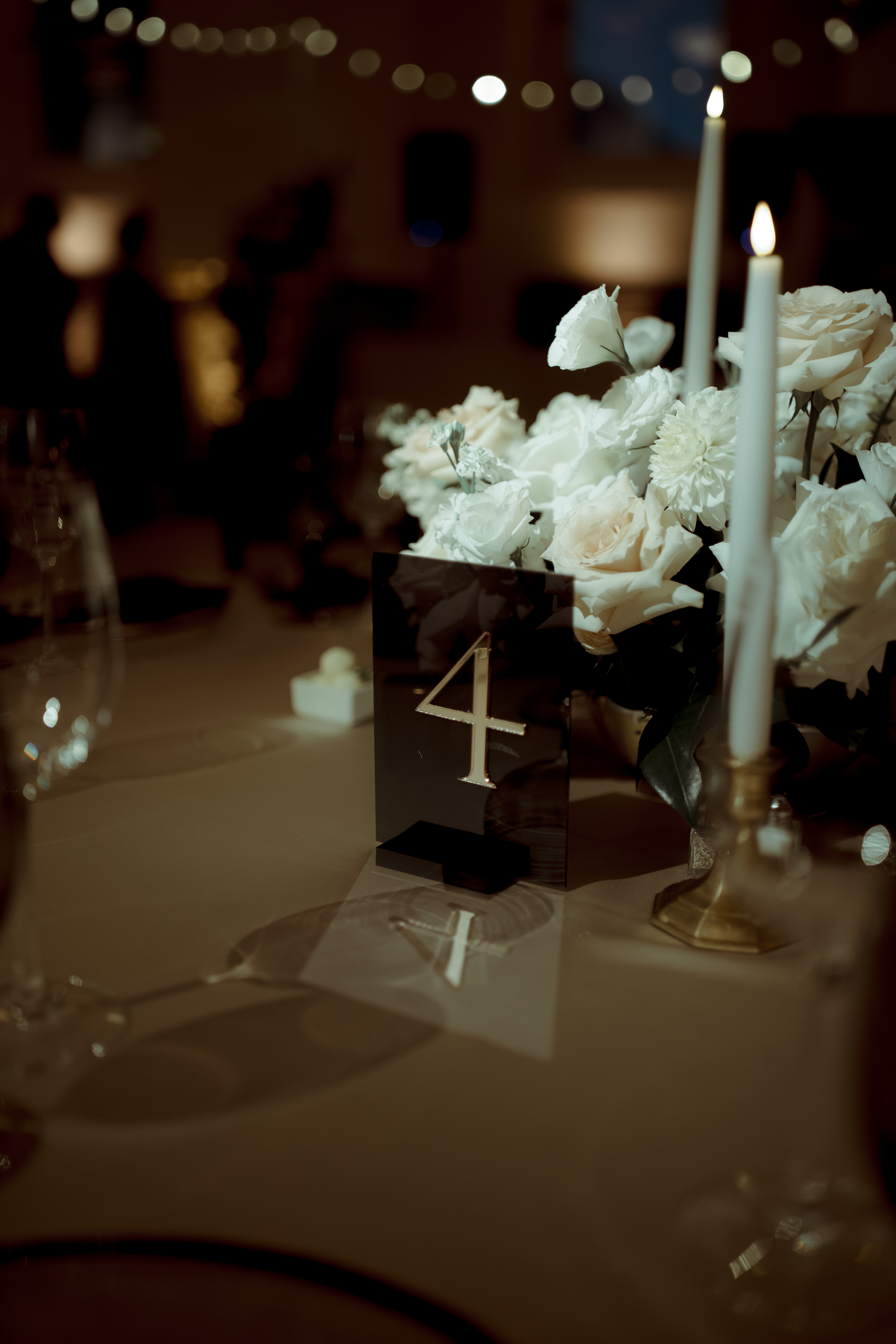 custom table number among florals and formal tablescape