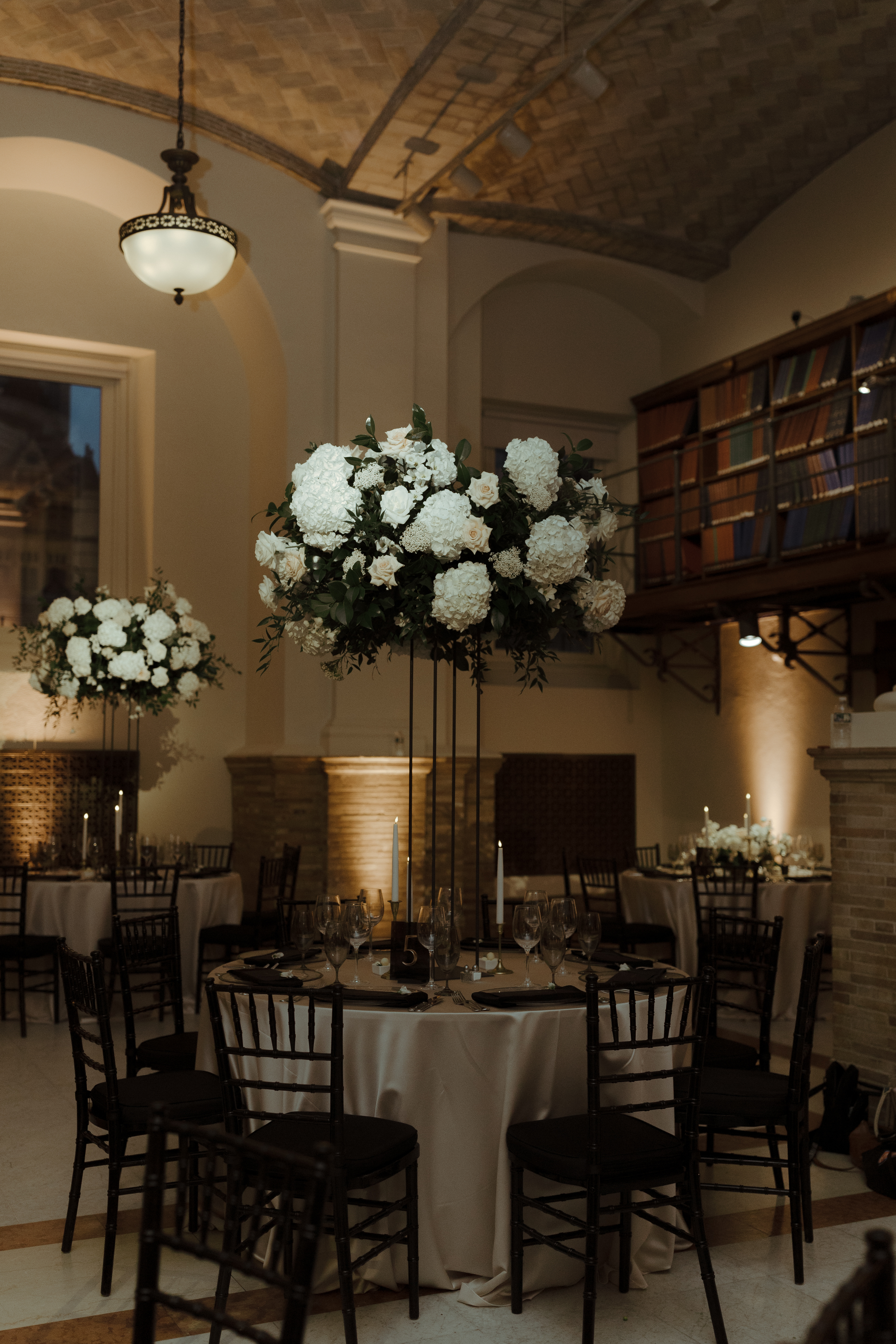 Formal reception tables styled with high florals