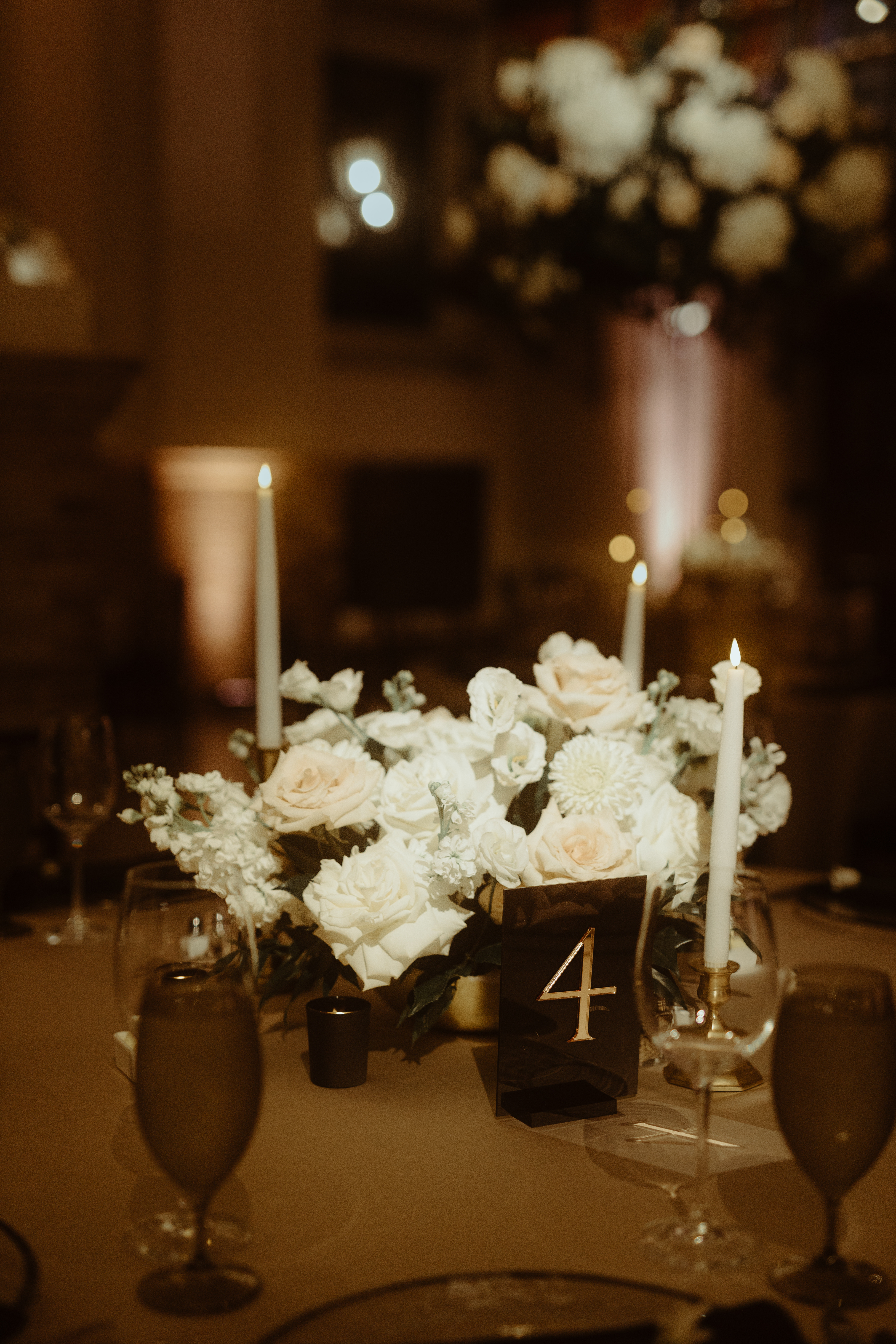 custom table number among florals and formal tablescape