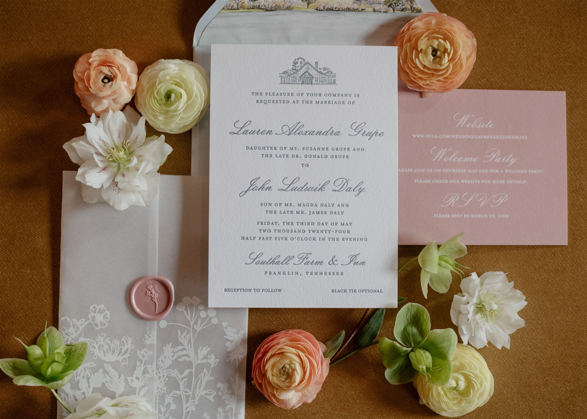 Flat lay of formal wedding invitation suite decorated with flowers | Custom Spring Wedding Details