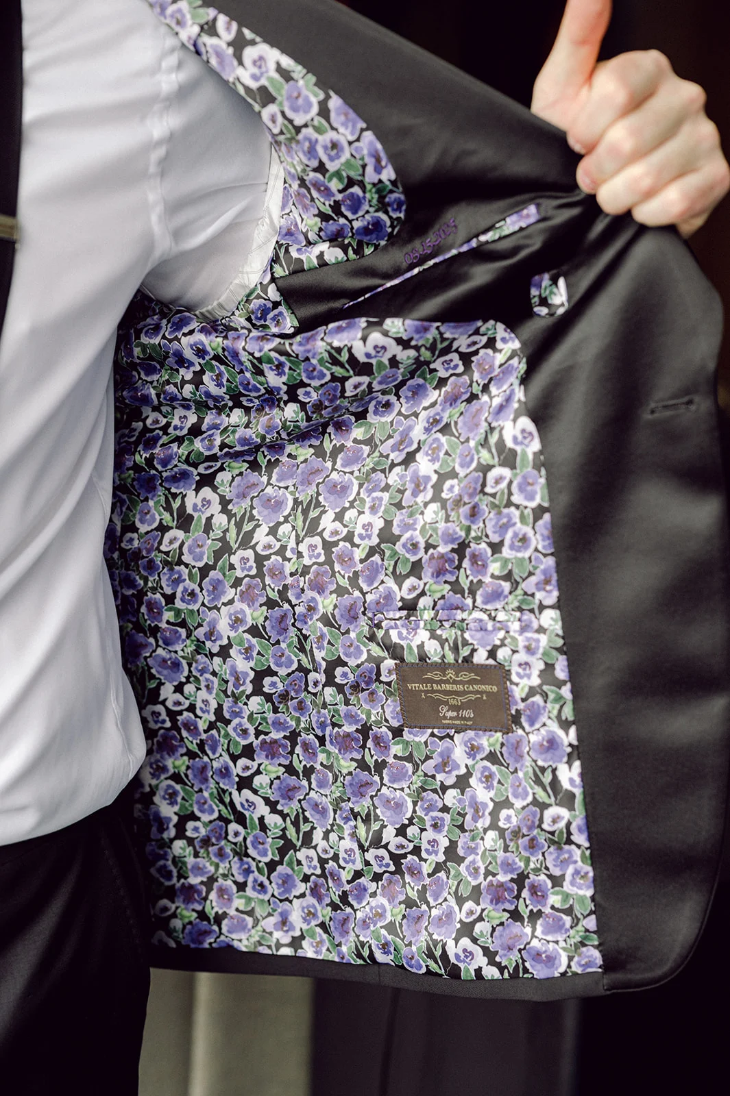 Lavender Wedding details | Lavender liner of groom's suit jacket