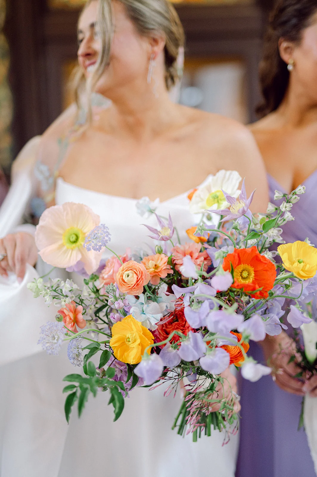 colorful bridal bouquet featuring lavender details.