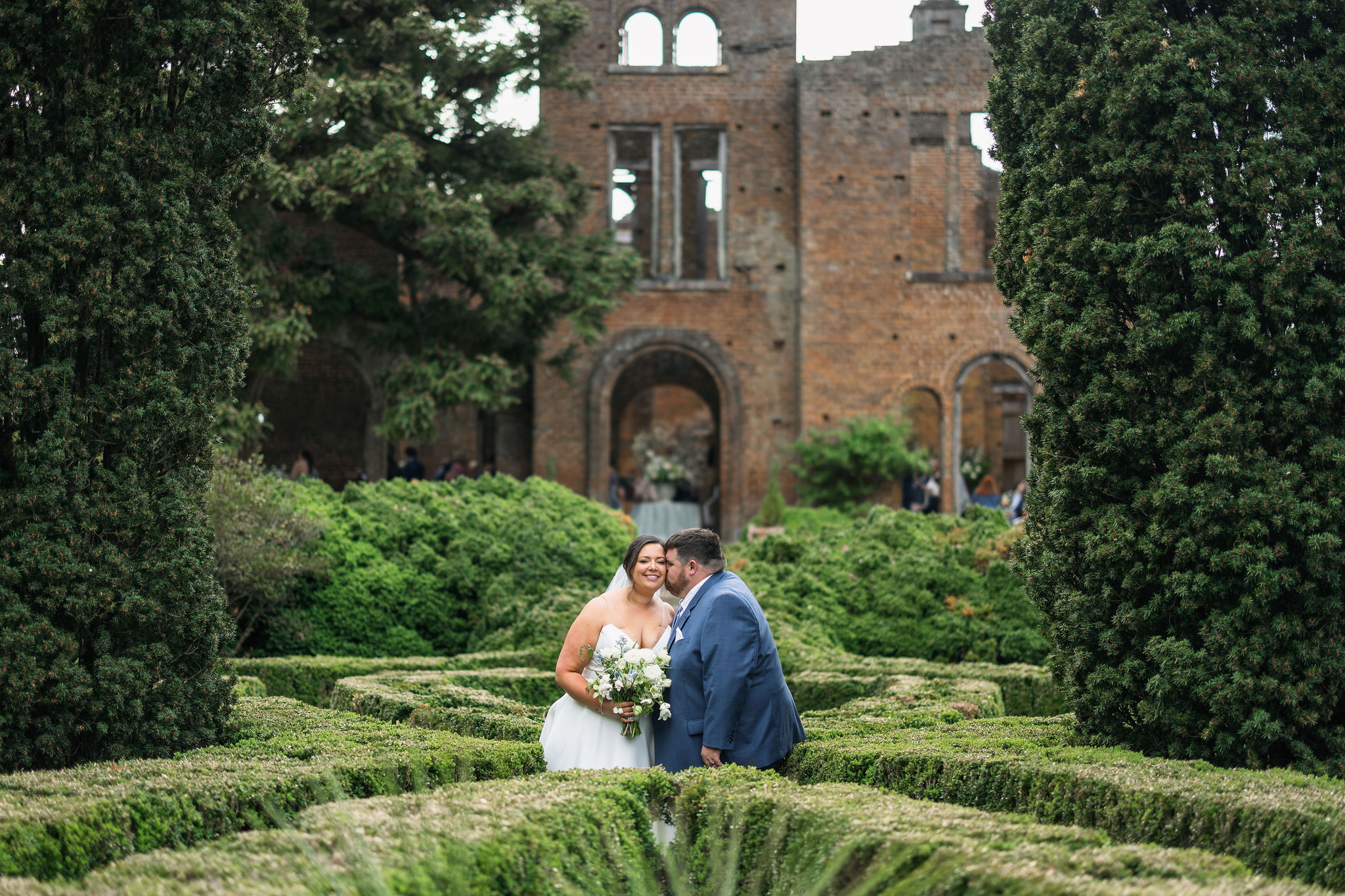 wedding photos of bride and groom in gardens at Barnsley Resort in Georgia