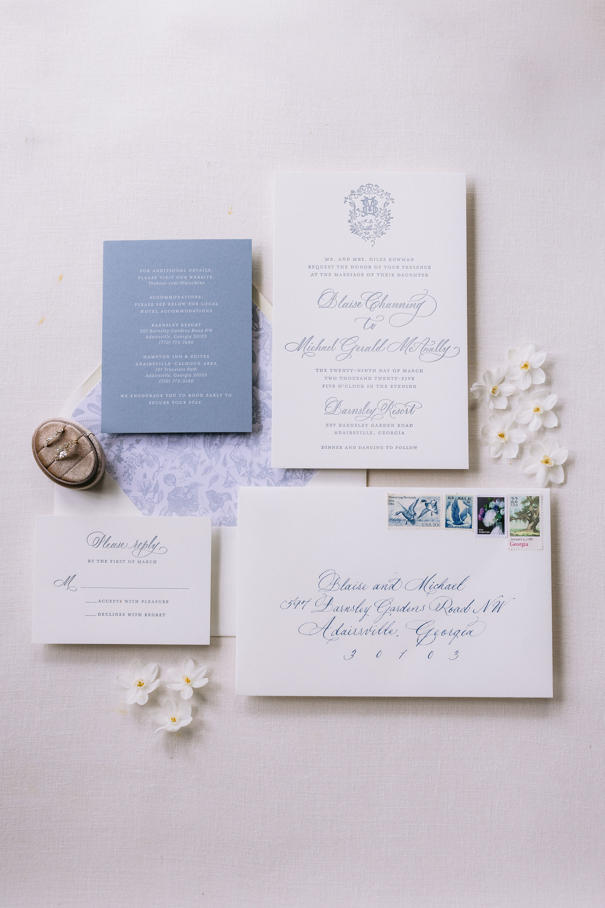 wedding invitation with the same monogram from wedding programs created by Nashville full-service calligraphy studio.