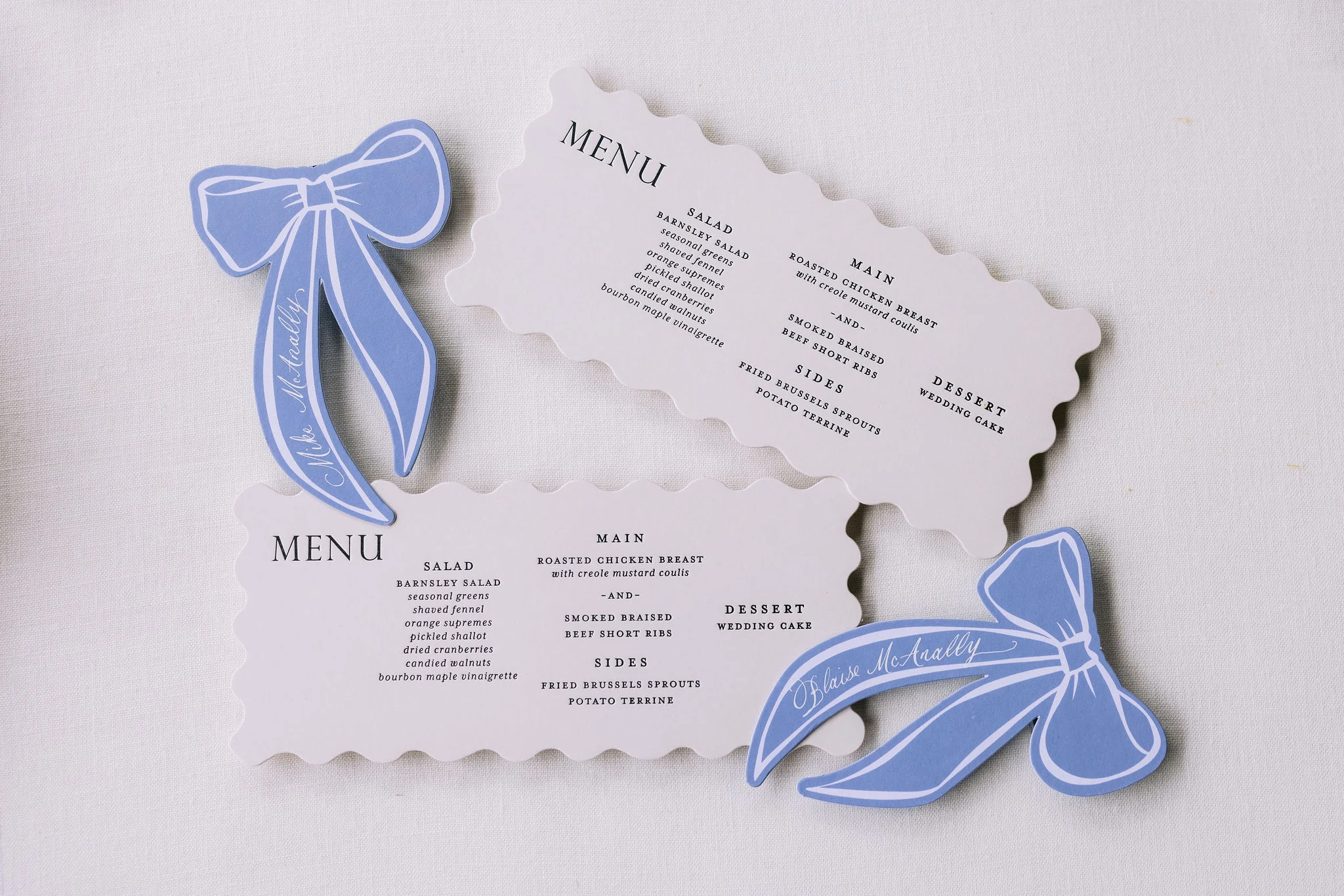 custom die cut menus and blue ribbon place cards from romantic Barnsley Resort Wedding. 