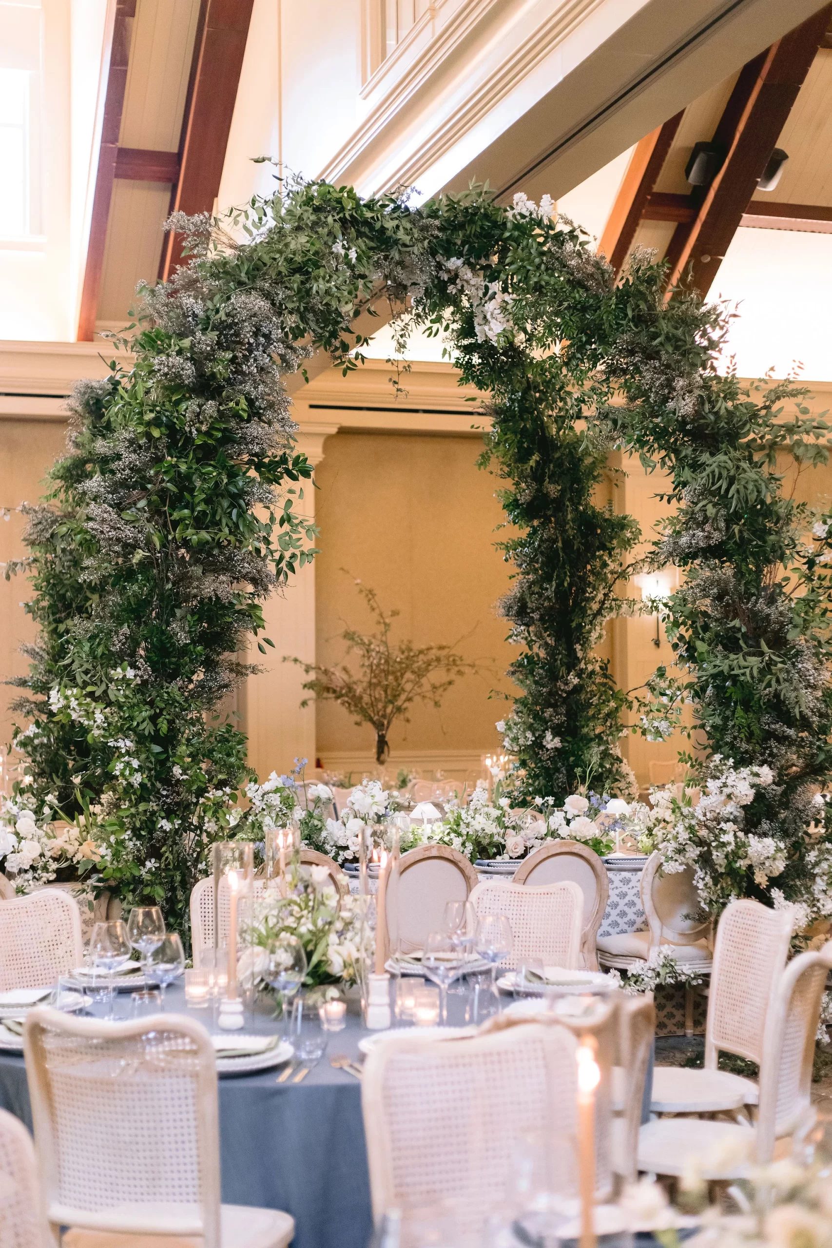enchanting floral arches surround elevated tablescape from Georgia wedding at Barnsley Resort. 