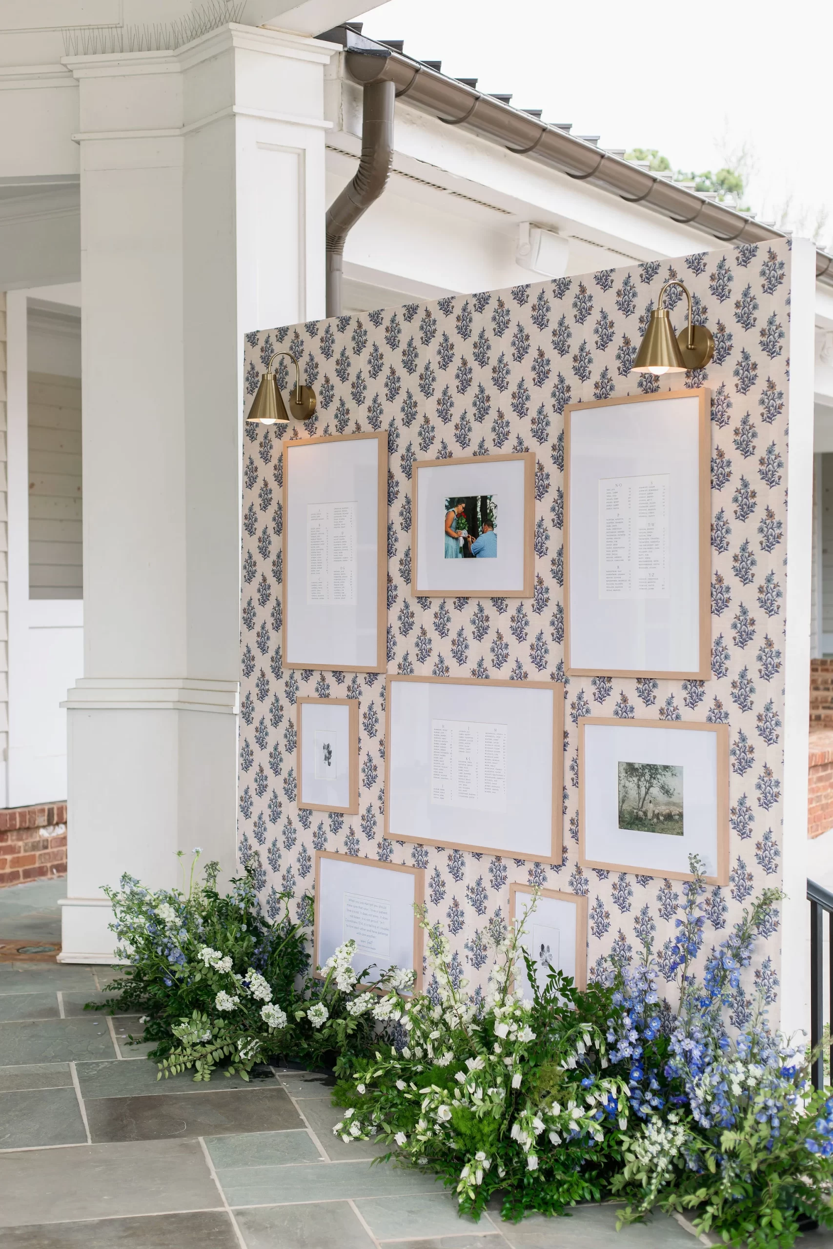 seating chart display with install in wallpaper and surrounded by enchanting florals 