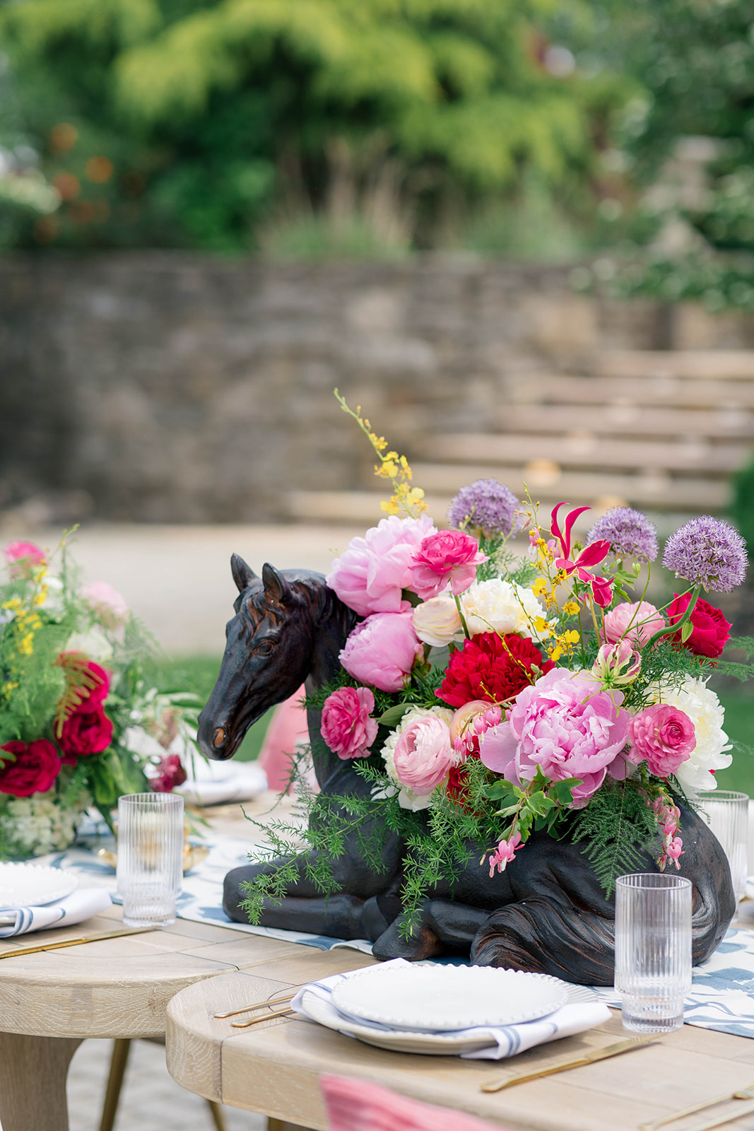 Kentucky Derby Inspired Event with horse vases as centerpieces 