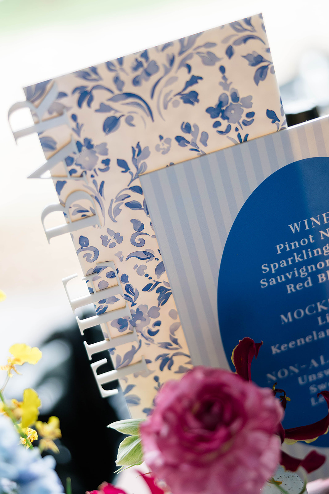 light blue bar sign with 3D wording on the side 