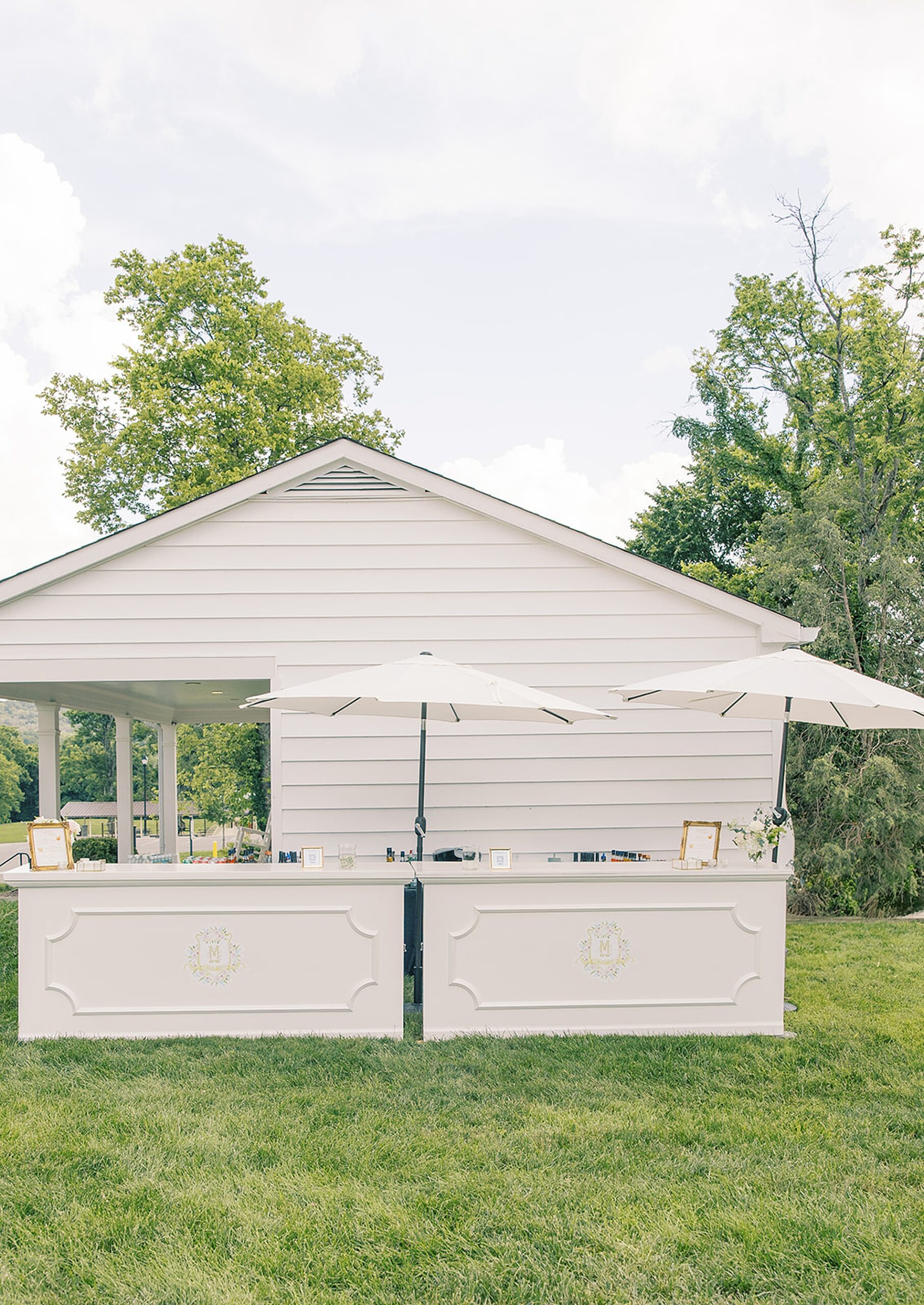 custom bar decals on white bar setup outdoors 