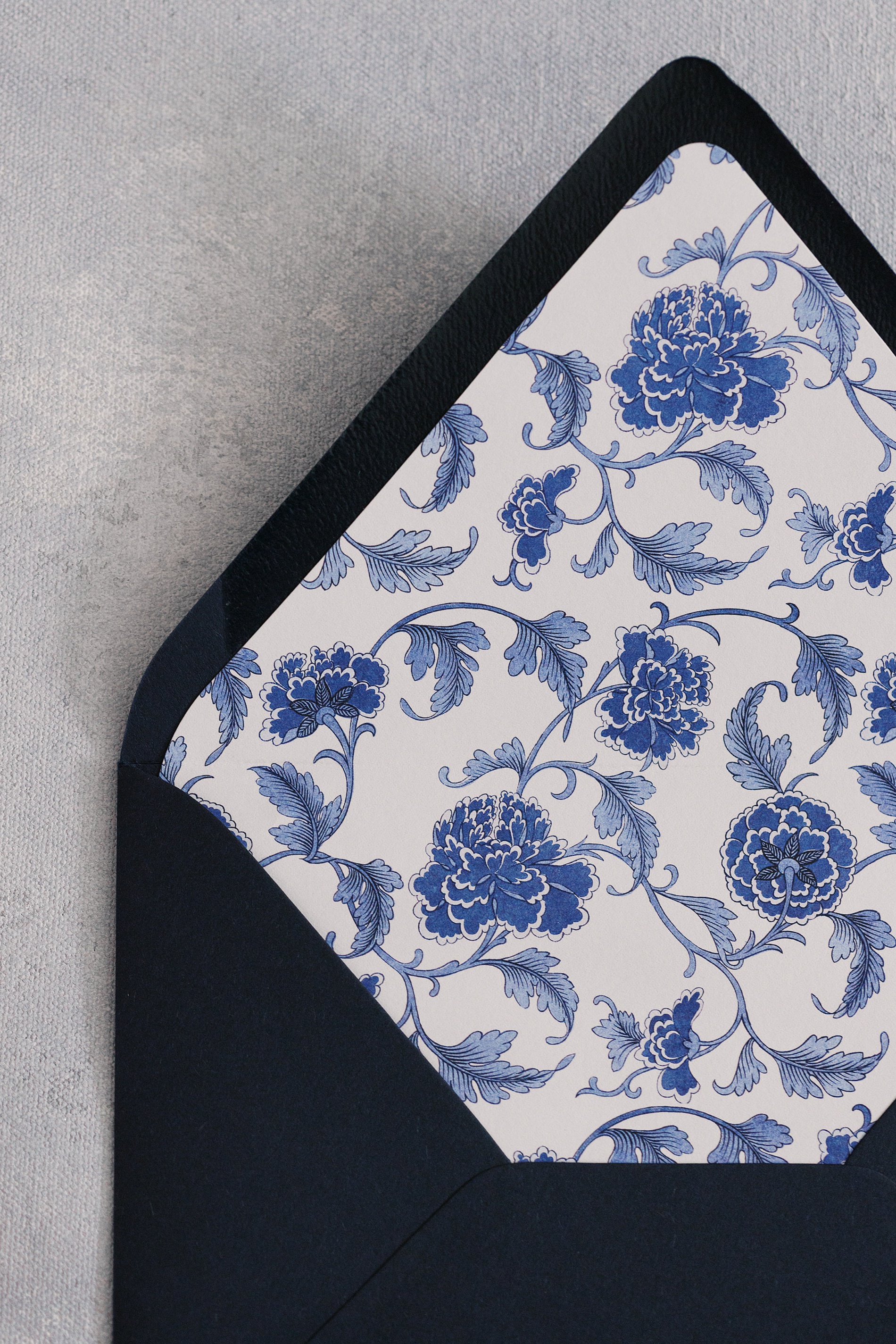 Envelope liner features blue design to replicate a classic ginger jar