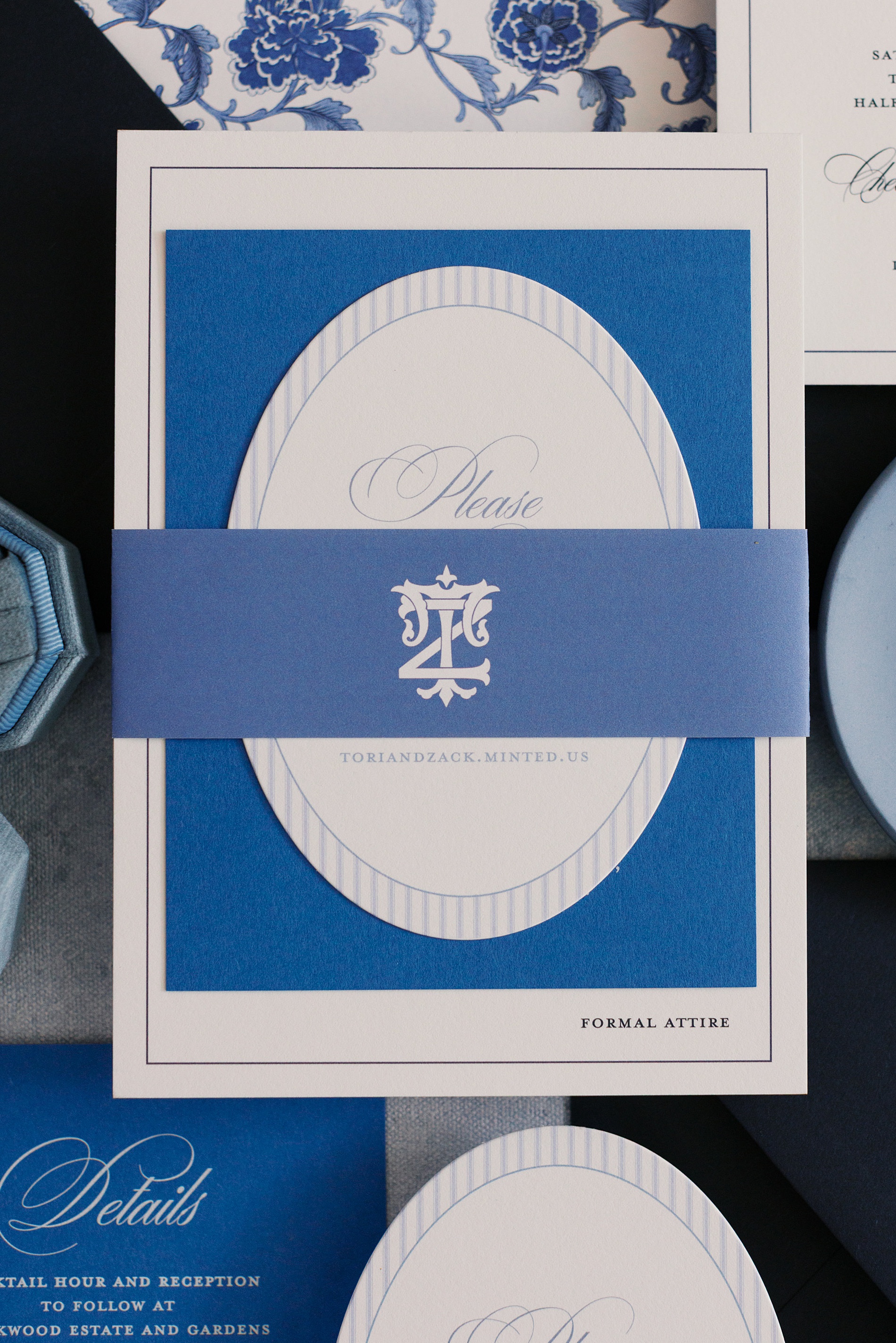 custom blue Nashville wedding invitation with belly band featuring monogram 