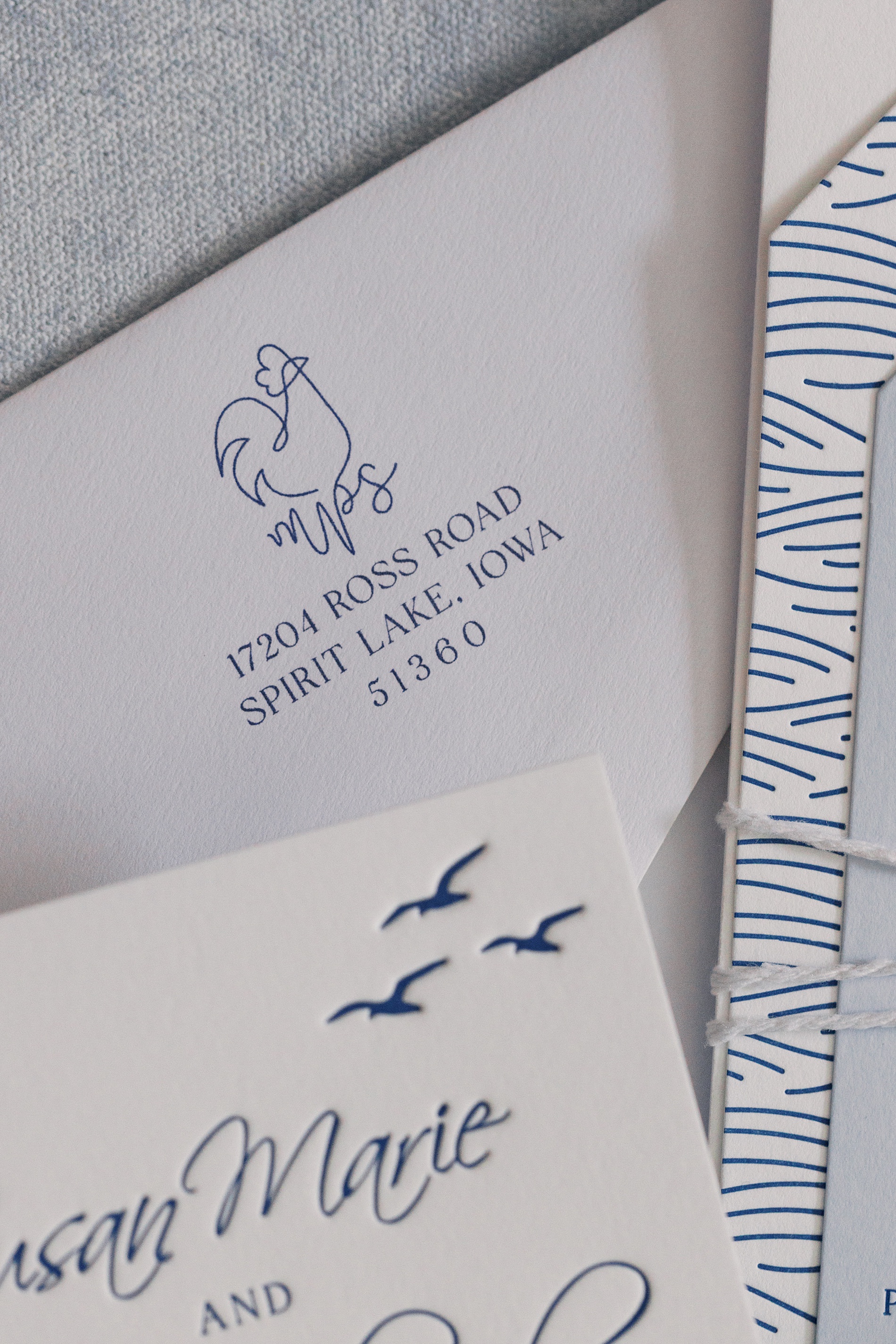 custom chicken monogram on envelope of Key West wedding invitation