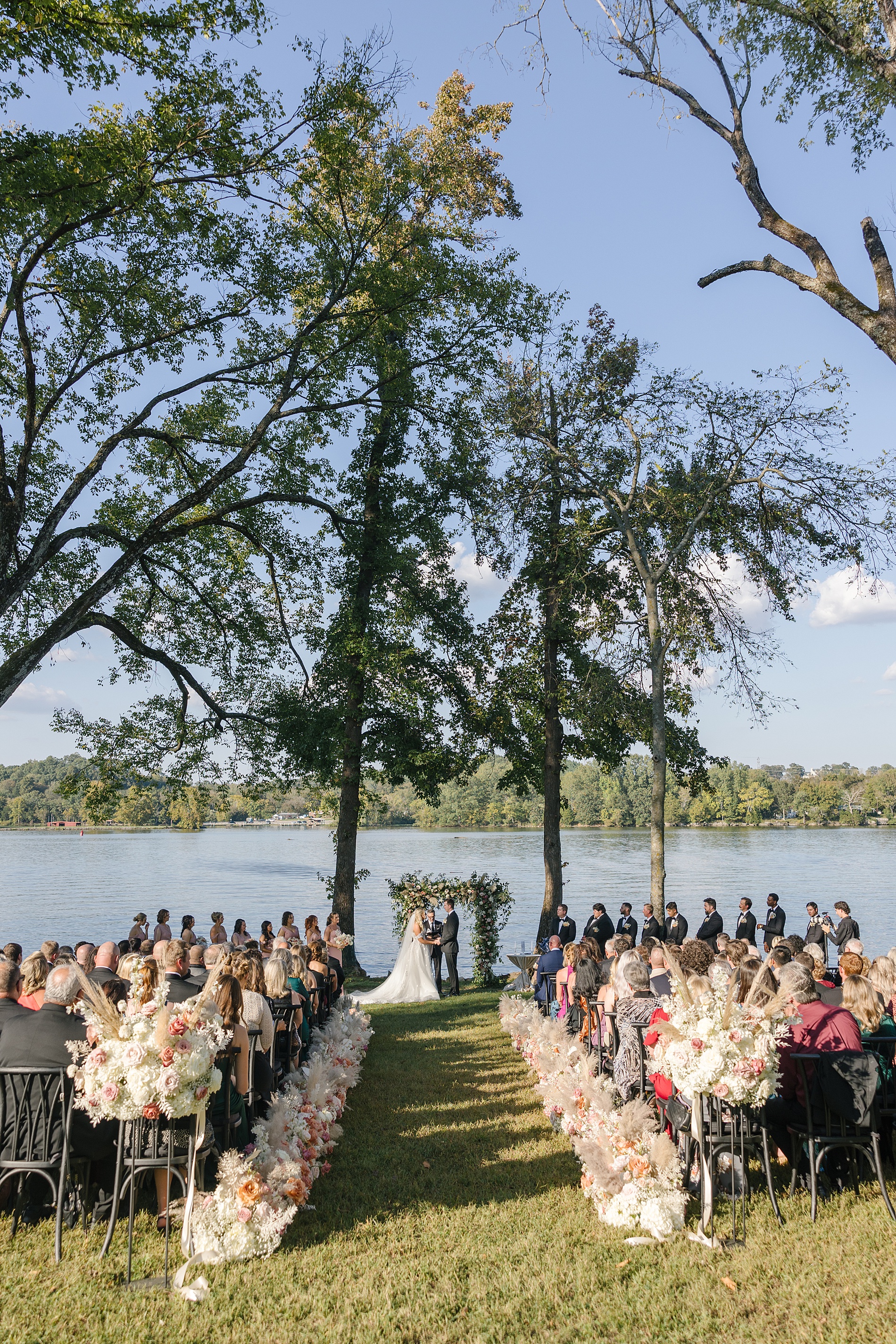 outdoor wedding ceremony facing the water at Cherokee Dock