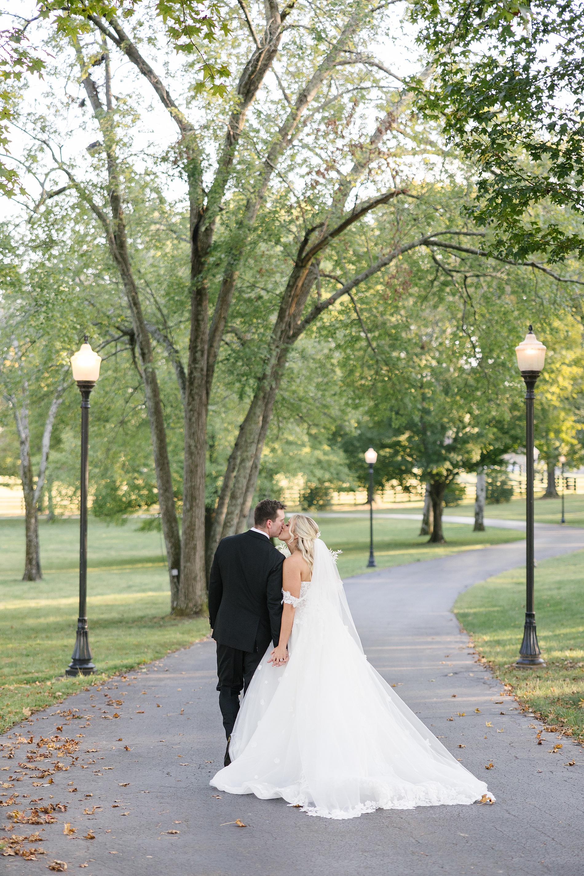bride and groom kiss at Nashville wedding venue Cherokee Dock