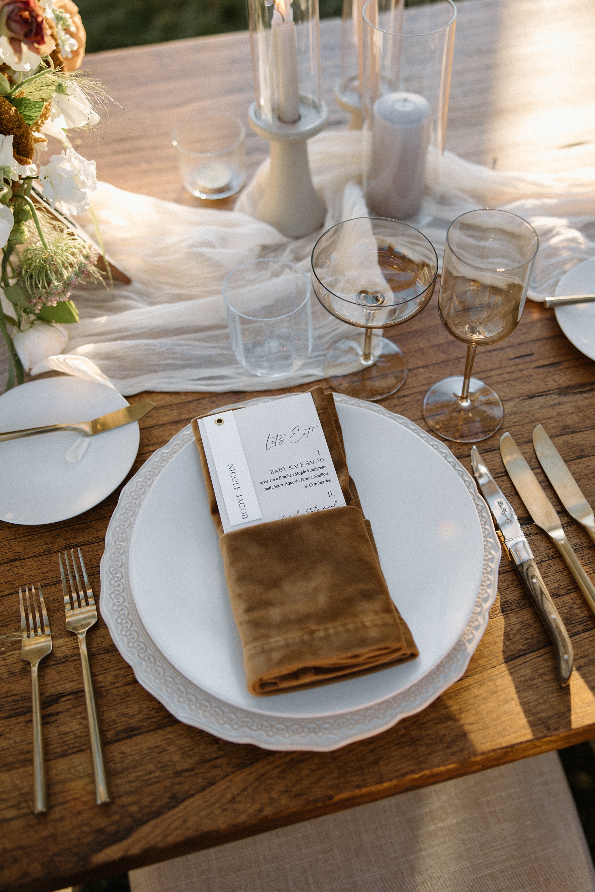 custom menu and place card tag wrapped in leather napkin from Western-Inspired Wyoming Ranch Wedding Details in Sheridan, WY