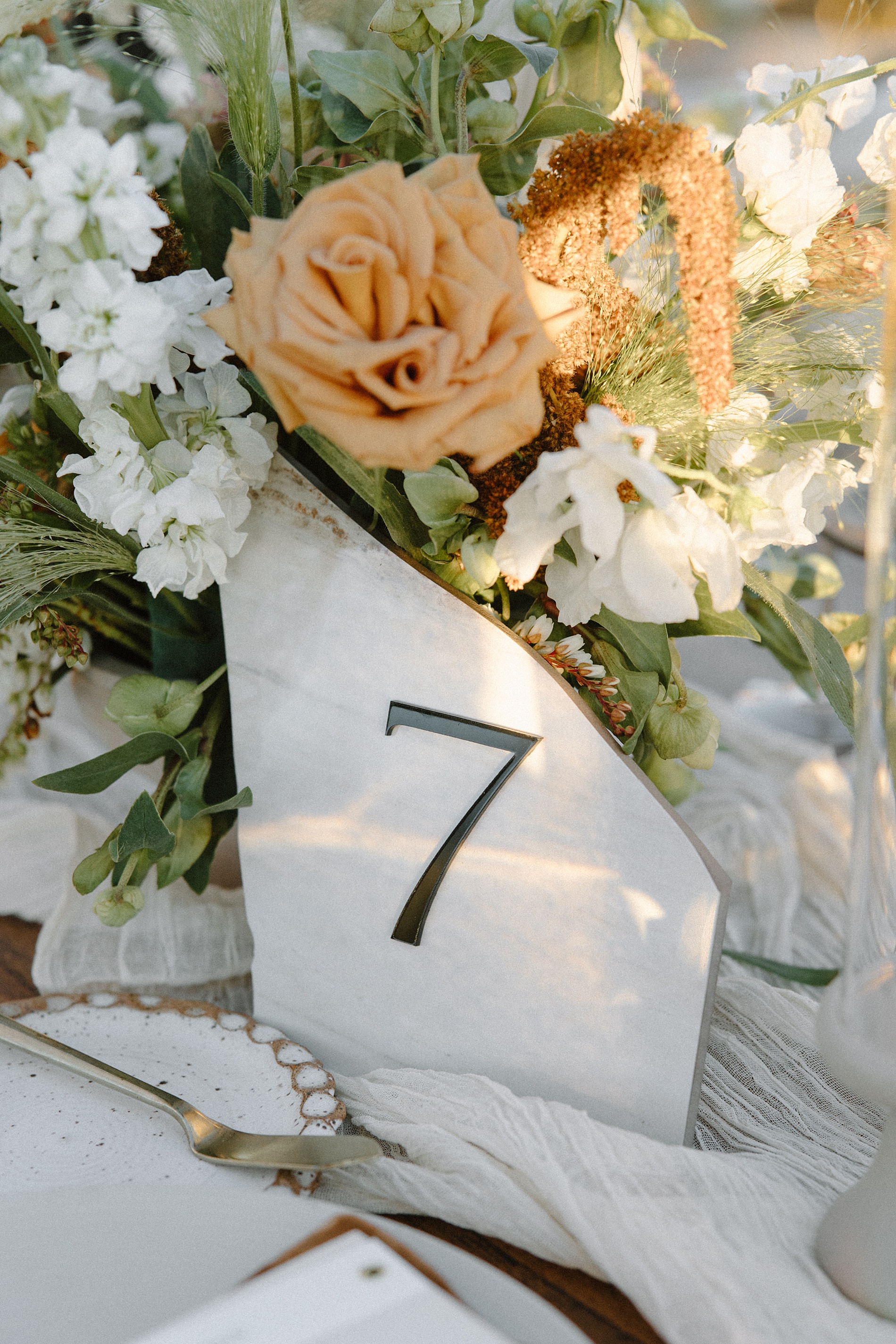 stone table number 7 from Western-Inspired Wyoming Ranch Wedding  