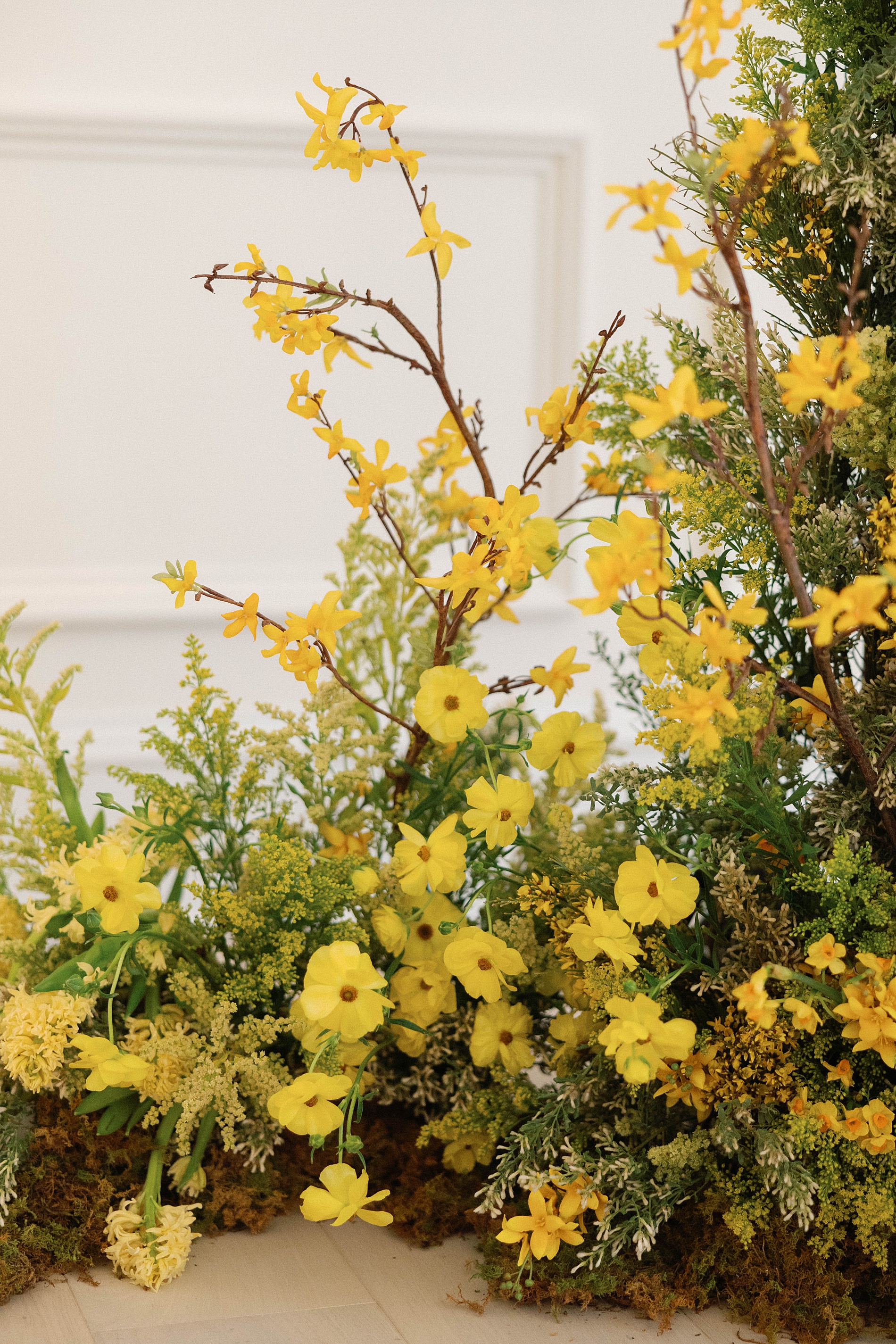 dainty yellow flowers from wedding ceremony 