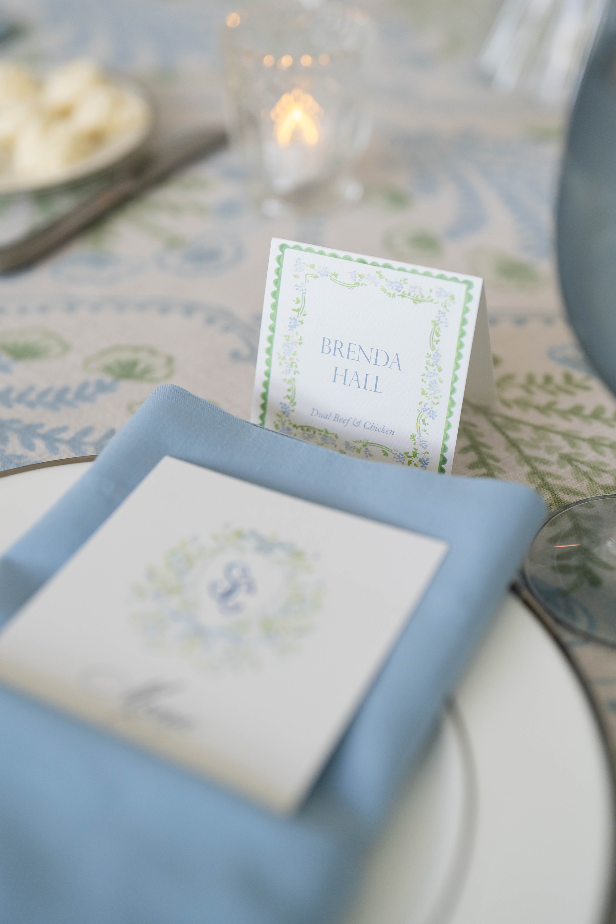 place cards and menu tucked in napkin from spring wedding 