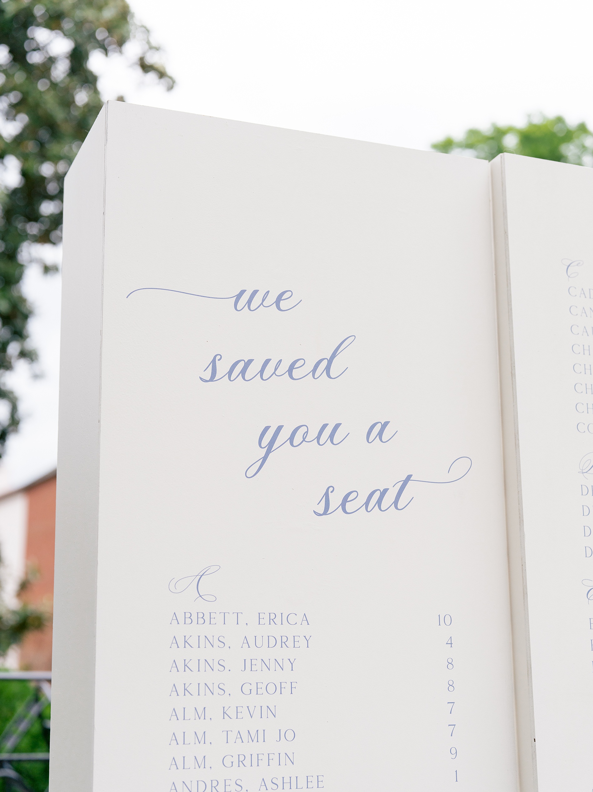 "we saved you a seat" quote on wedding seating chart 