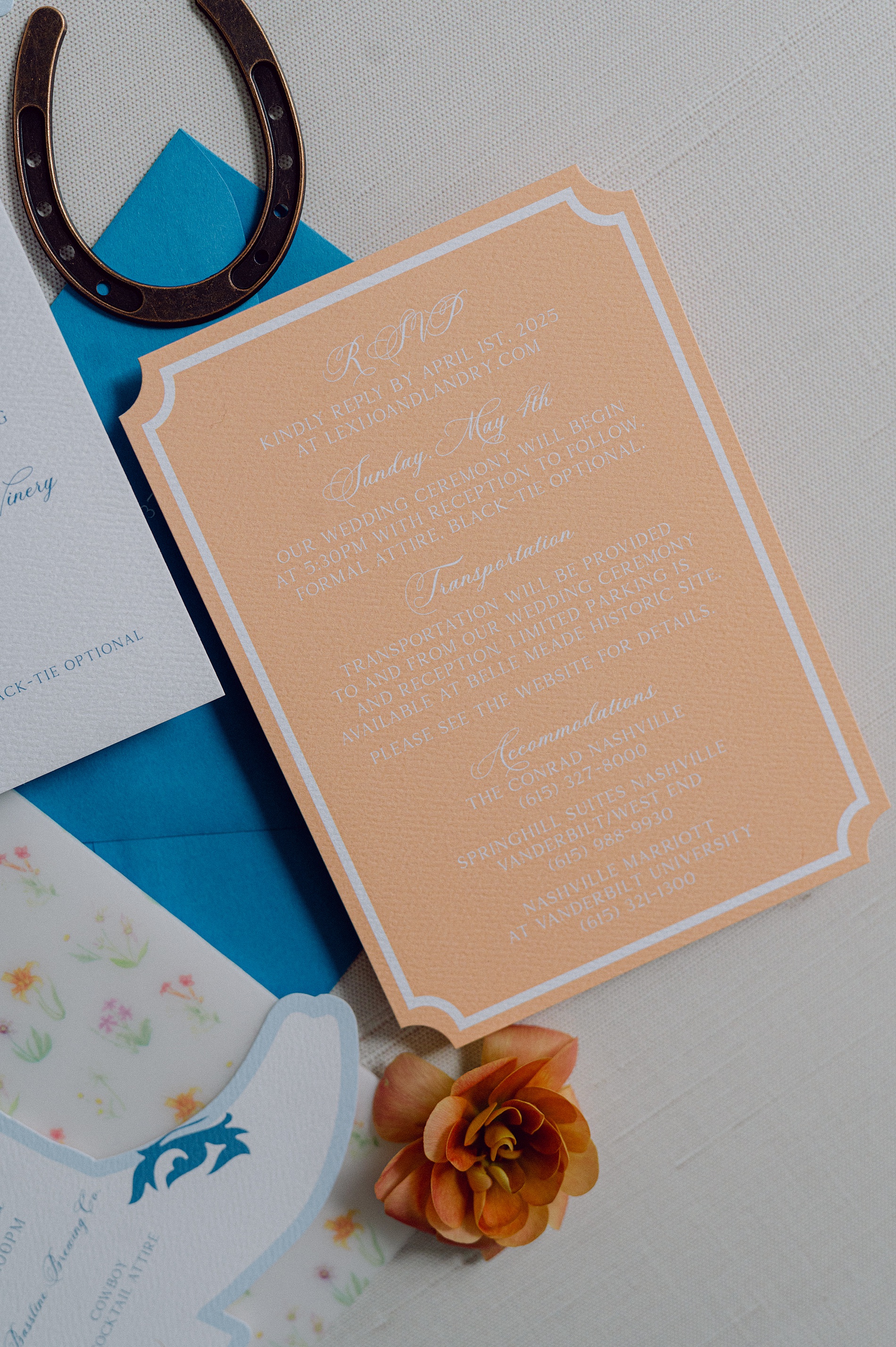 orange sherbet rsvp and wedding details card with white calligraphy 
