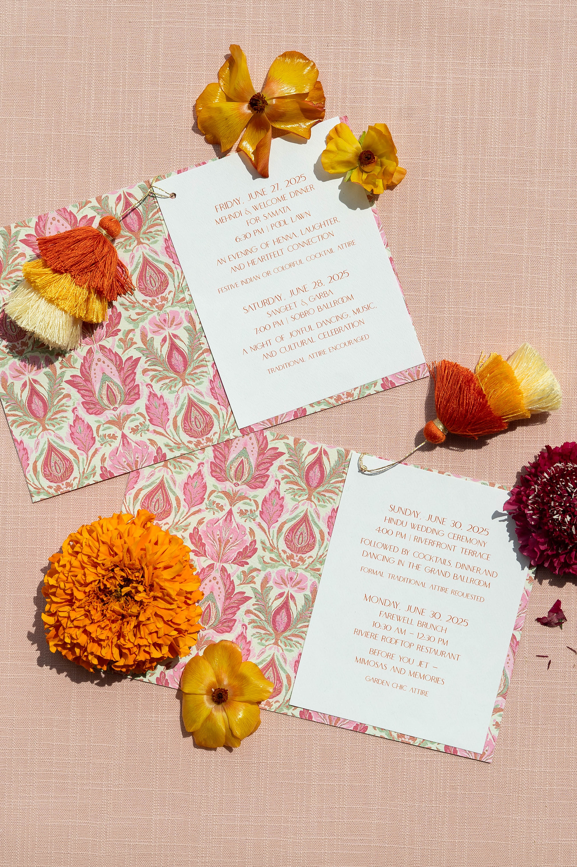 wedding details booklet in with pink and green paisley design 