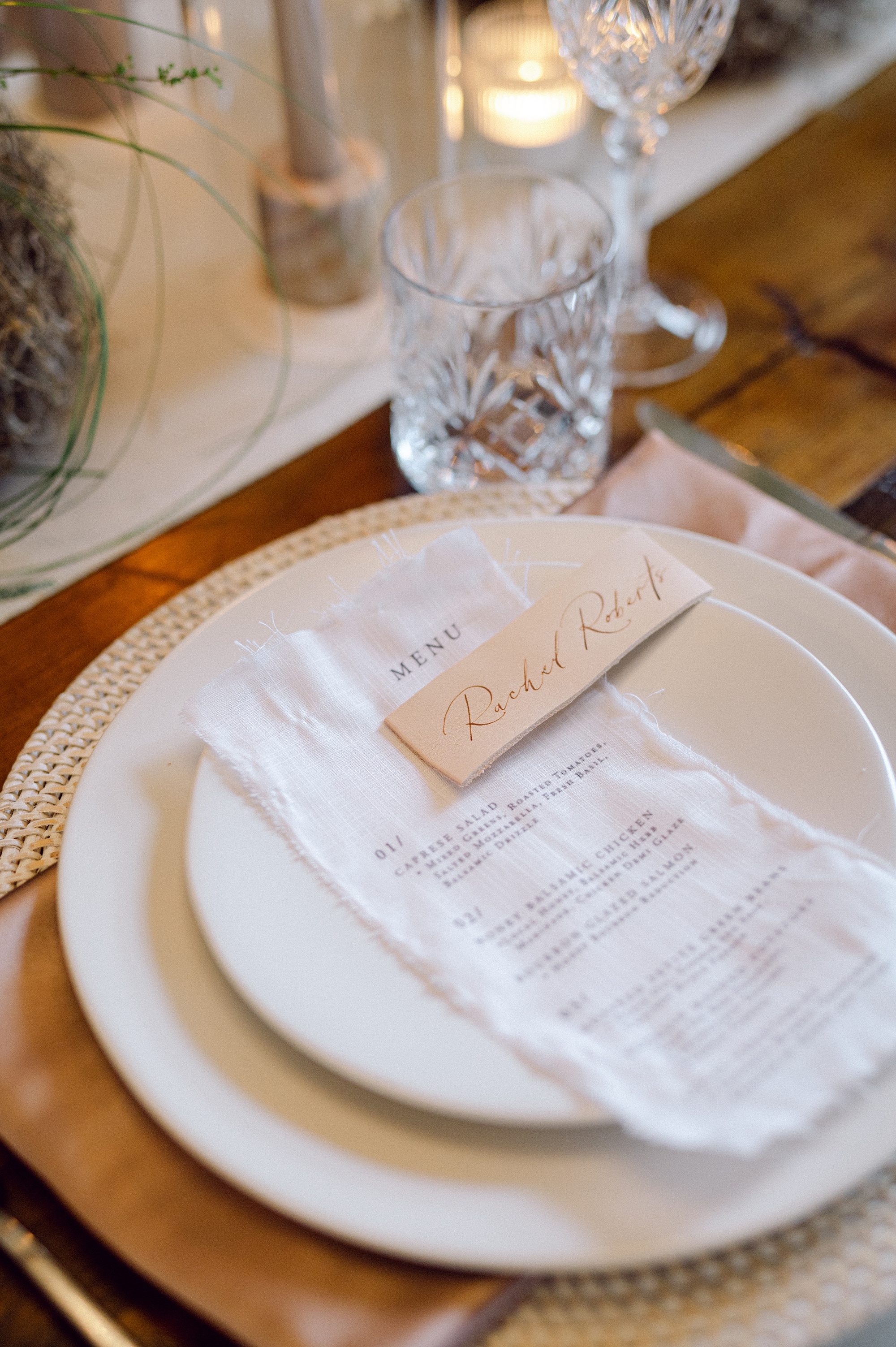 leather place cards on fabric menus 