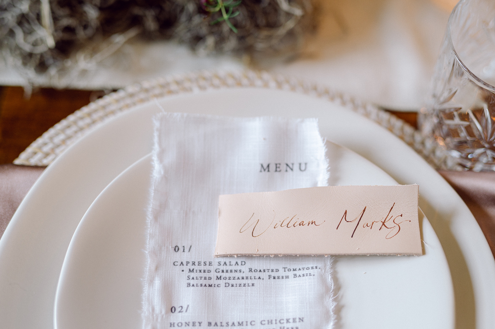 leather place cards on fabric menus 