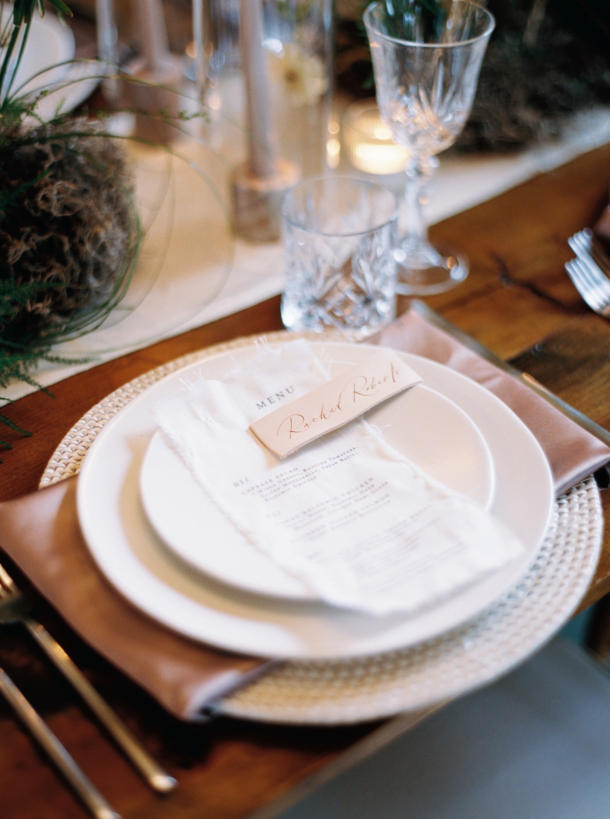 fabric menus and leather place cards  