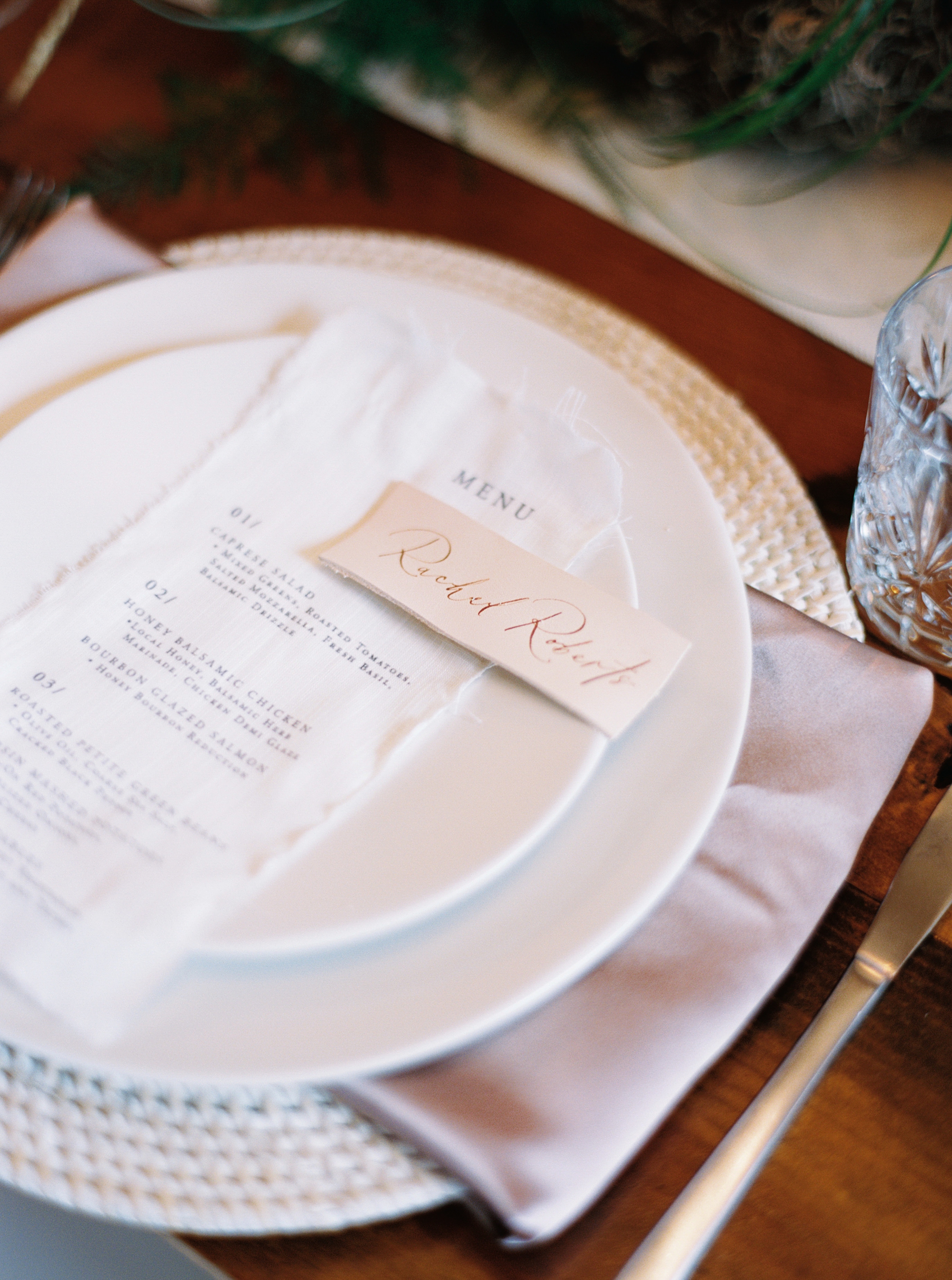 fabric menus and leather place cards  