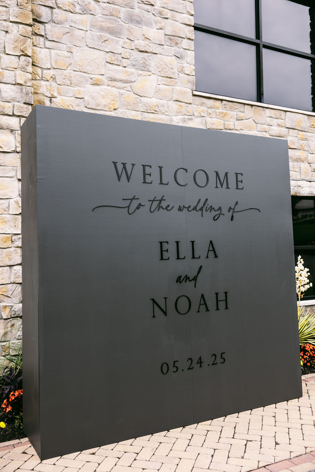 black on black welcome wall at Diamond Creek Farms Wedding