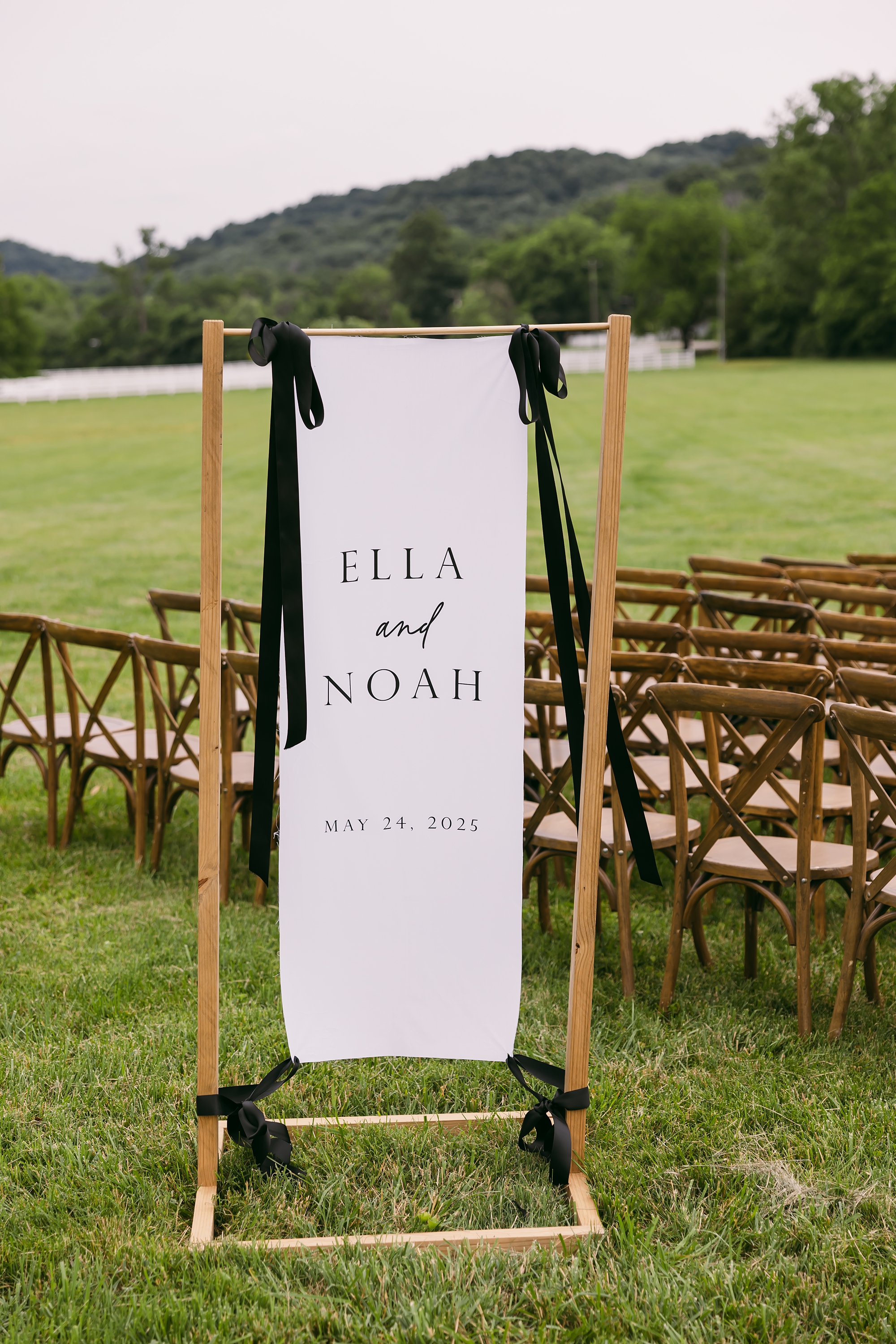 Fabric wedding welcome sign for outdoor ceremony