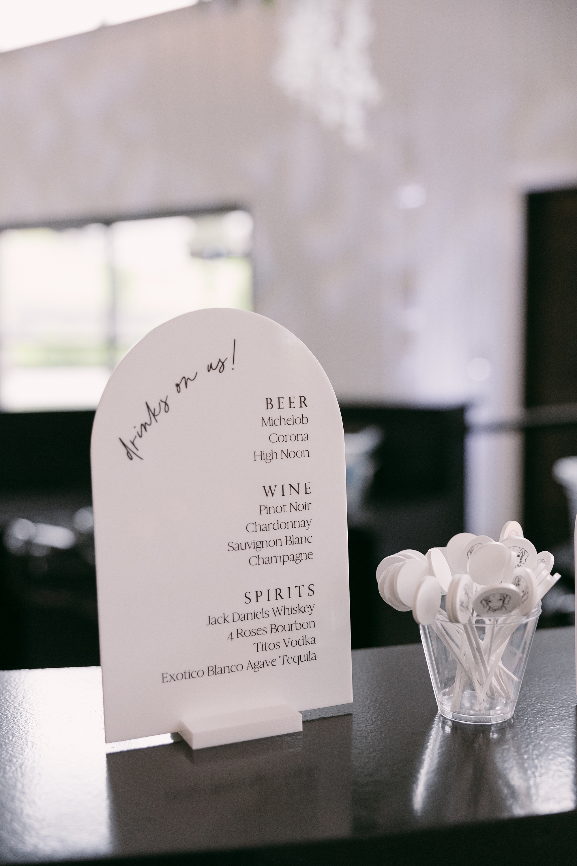 white tombstone bar sign 