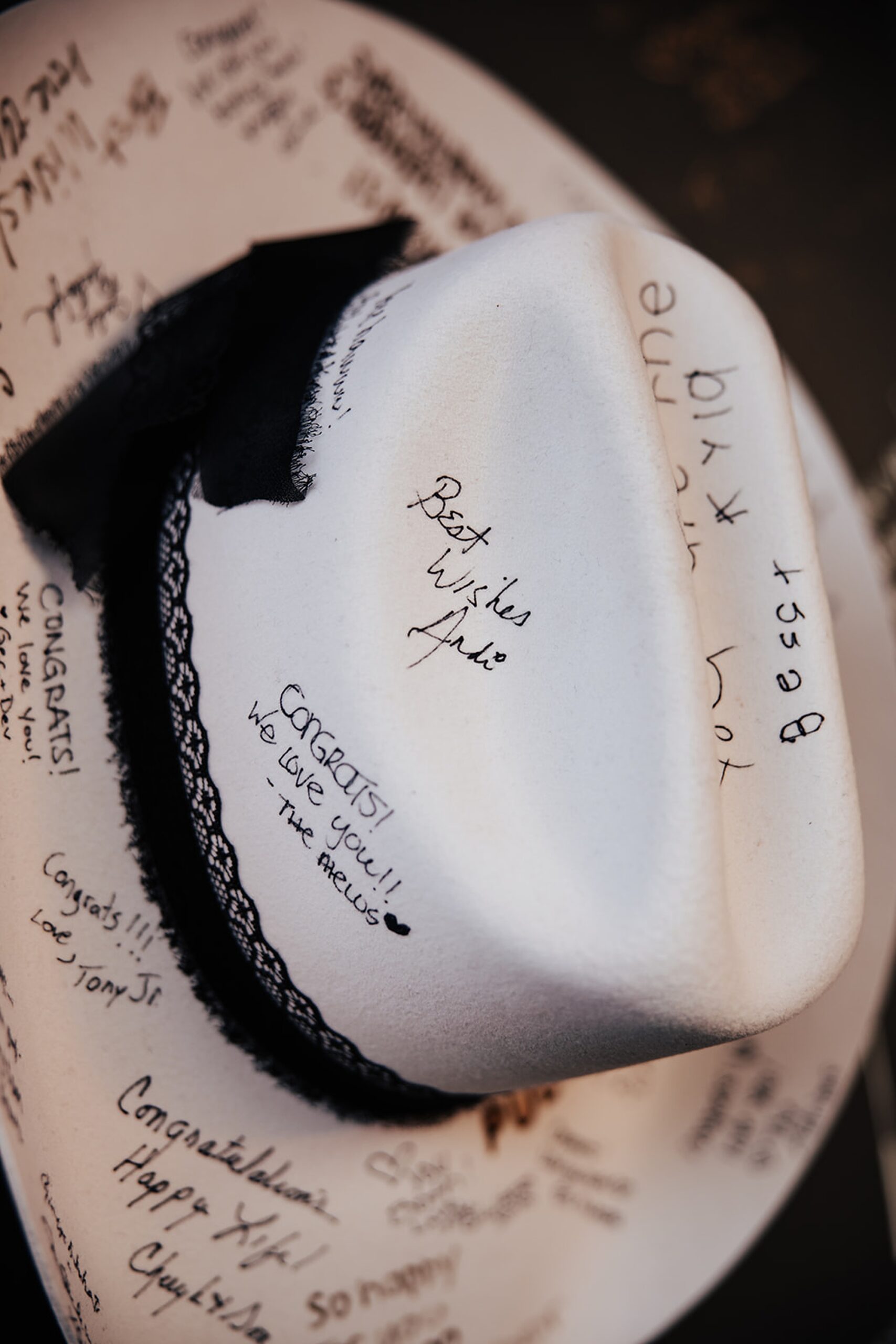 white cowboy hat with guest signatures
