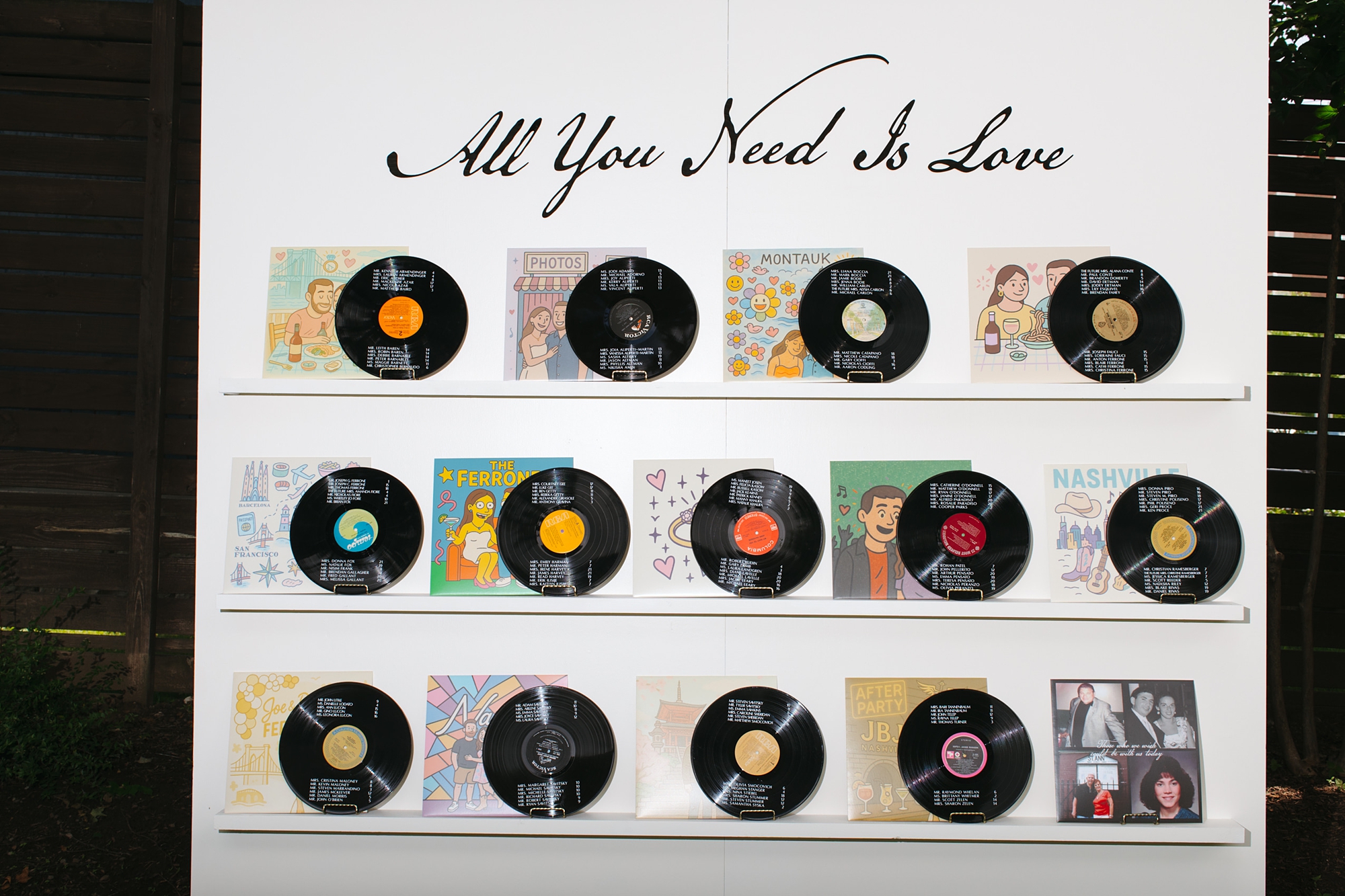 Custom seating chart installation using Vinyl Records |  Vinyl Record Wedding Details at The Cordelle