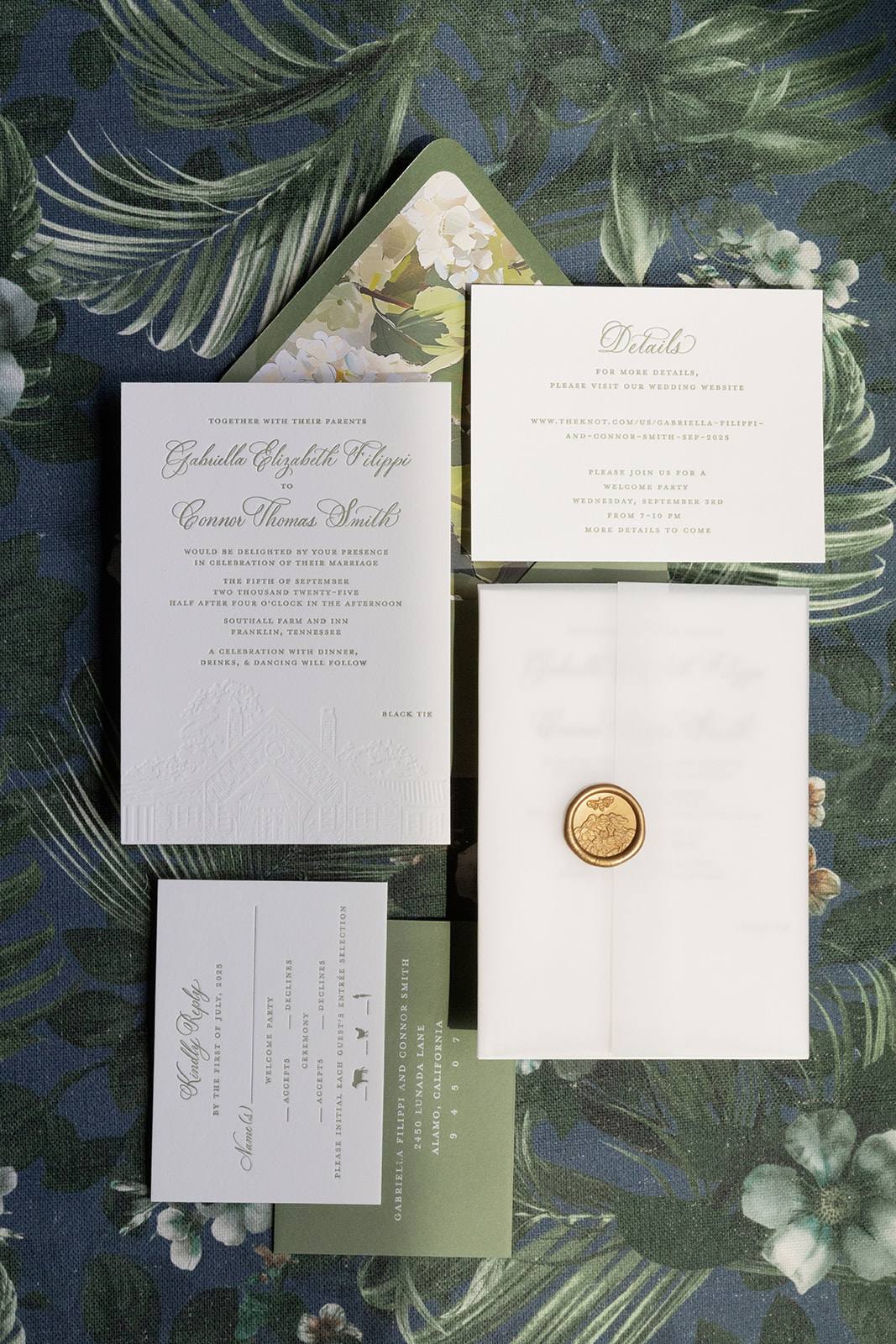 Custom invitation suite with floral envelope liner, letter-pressed main invitation, and gold wax seal 