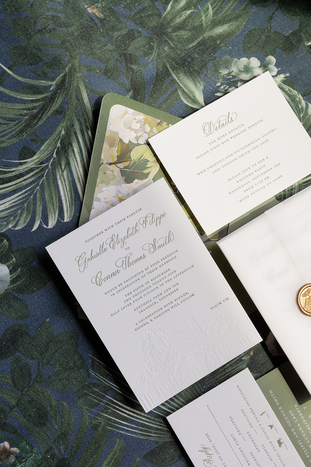 Custom invitation suite with floral envelope liner, letter-pressed main invitation, and gold wax seal 