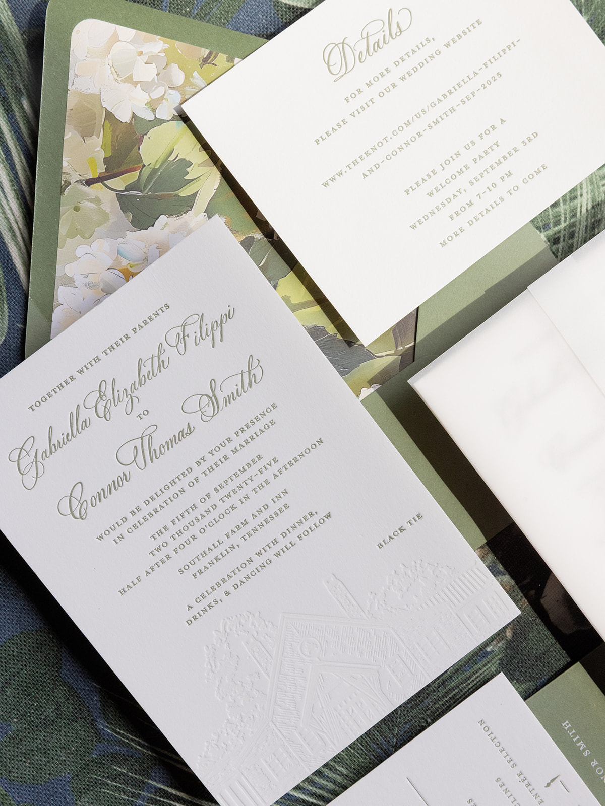 Custom invitation suite with floral envelope liner, letter-pressed main invitation, and gold wax seal 