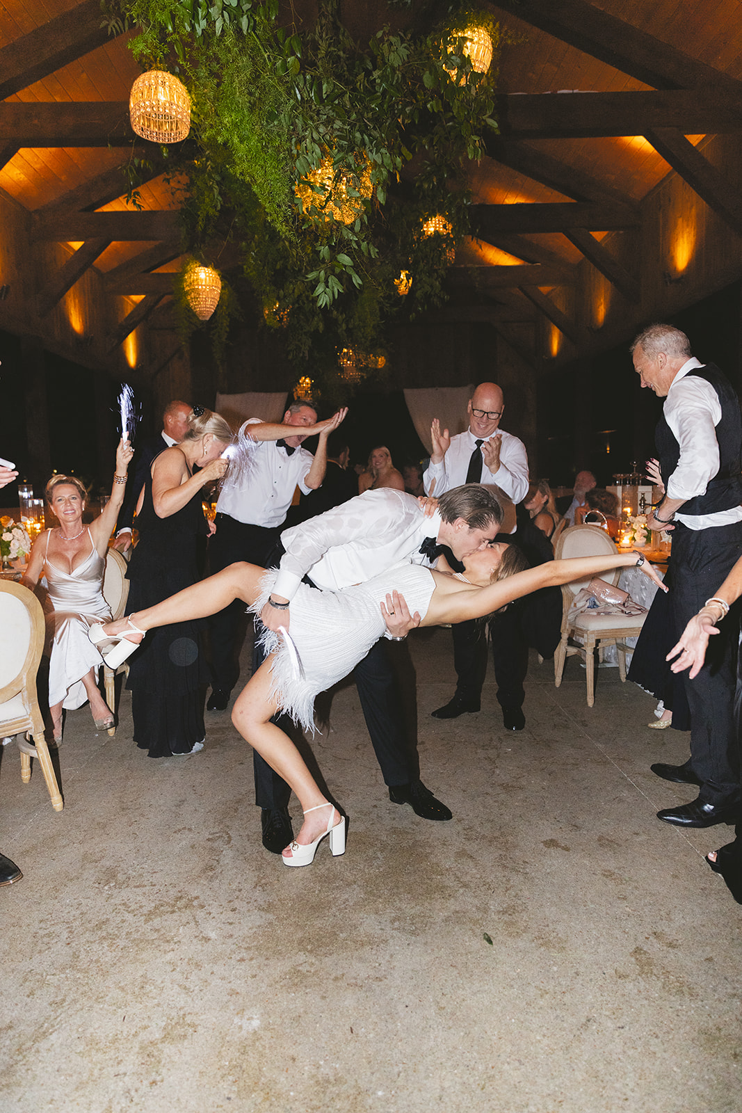 Newlyweds kiss at the end of night 
