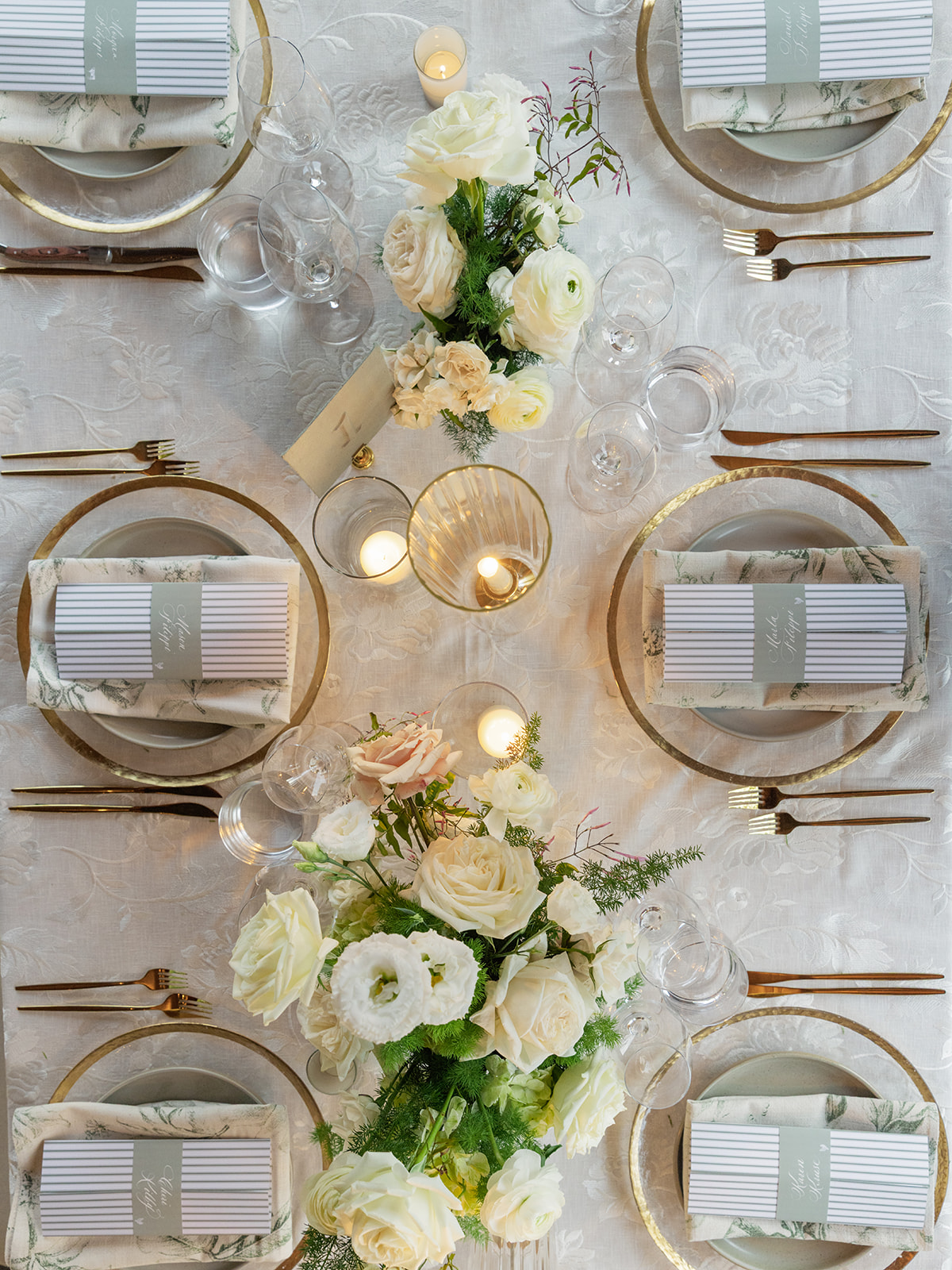 custom gatefold menus with calligraphed place cards wrapped around menu  creating an elevated tablescape