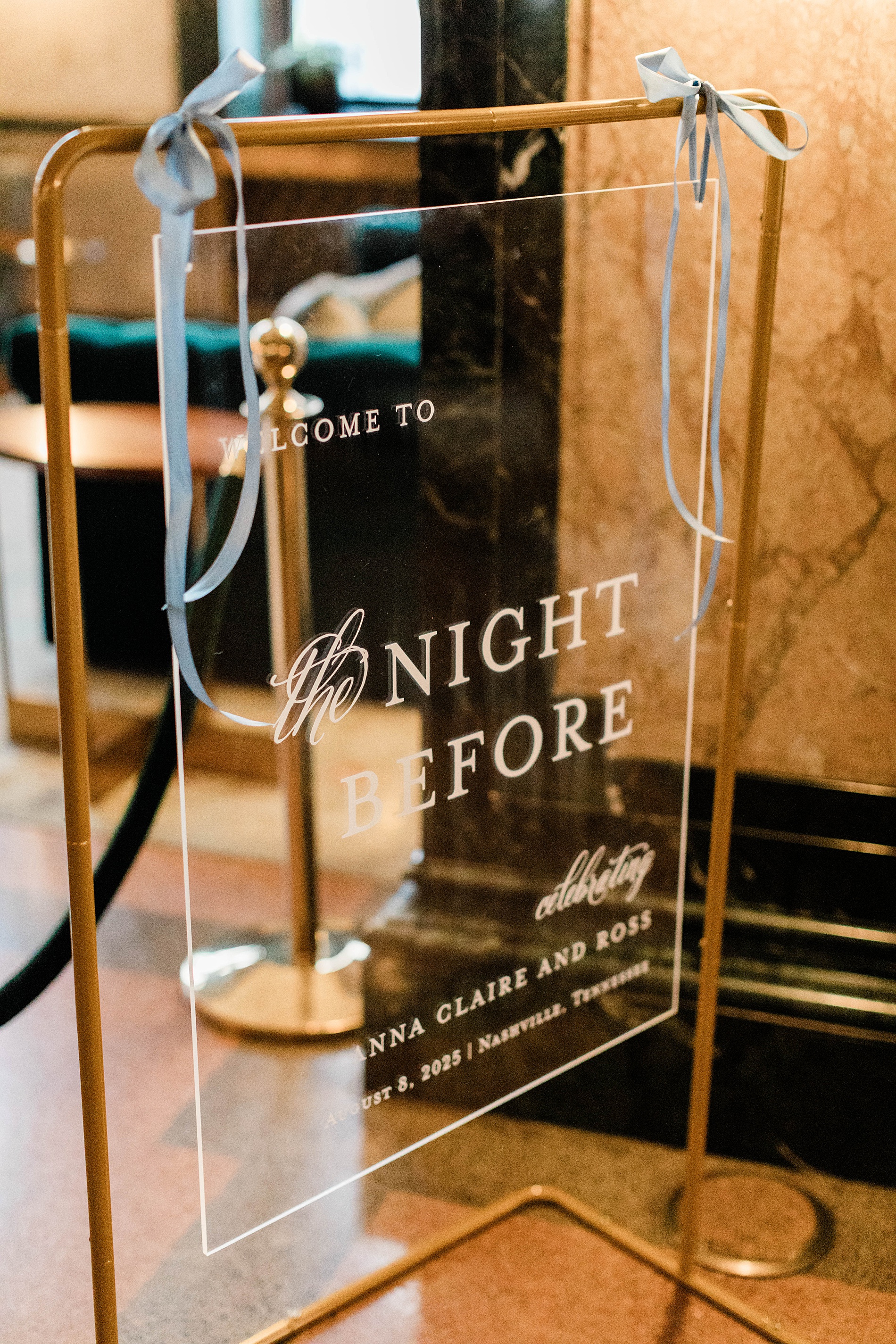 mirrored welcome sign for Nashville rehearsal dinner at The Noelle Hotel Nashville